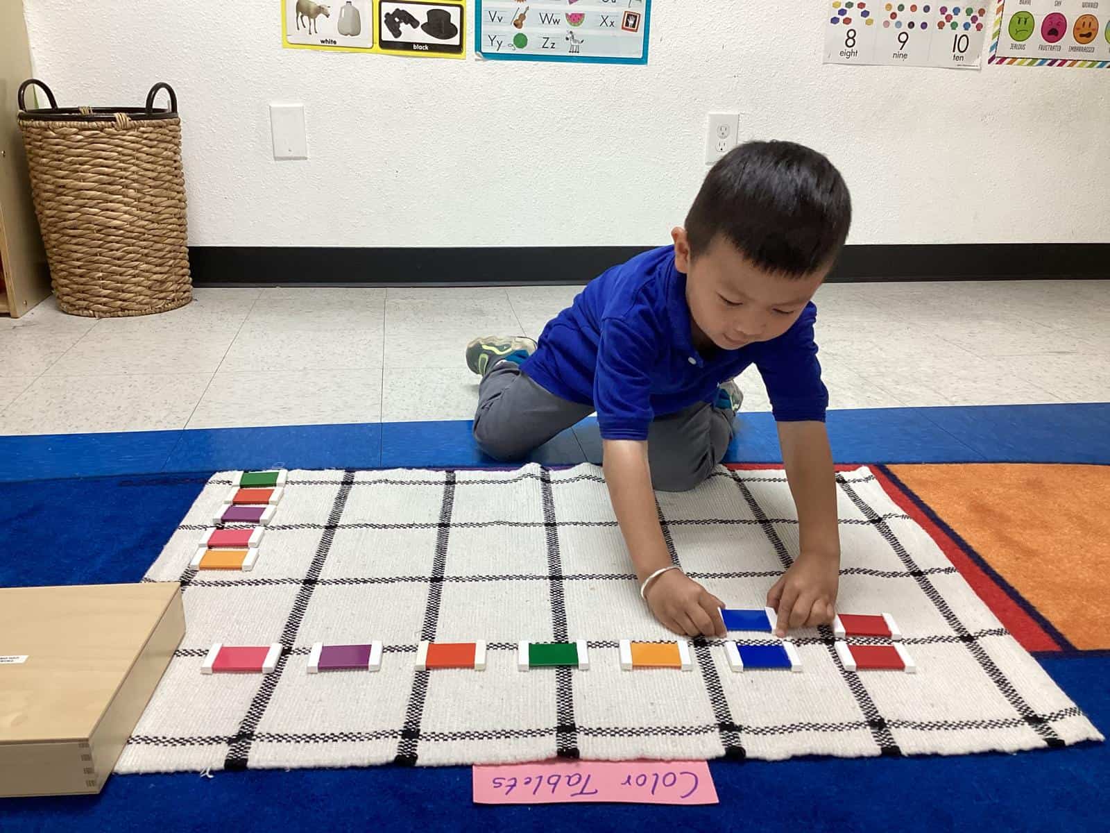 Kingsbridge Montessori children exploring learning materials, activity 2
