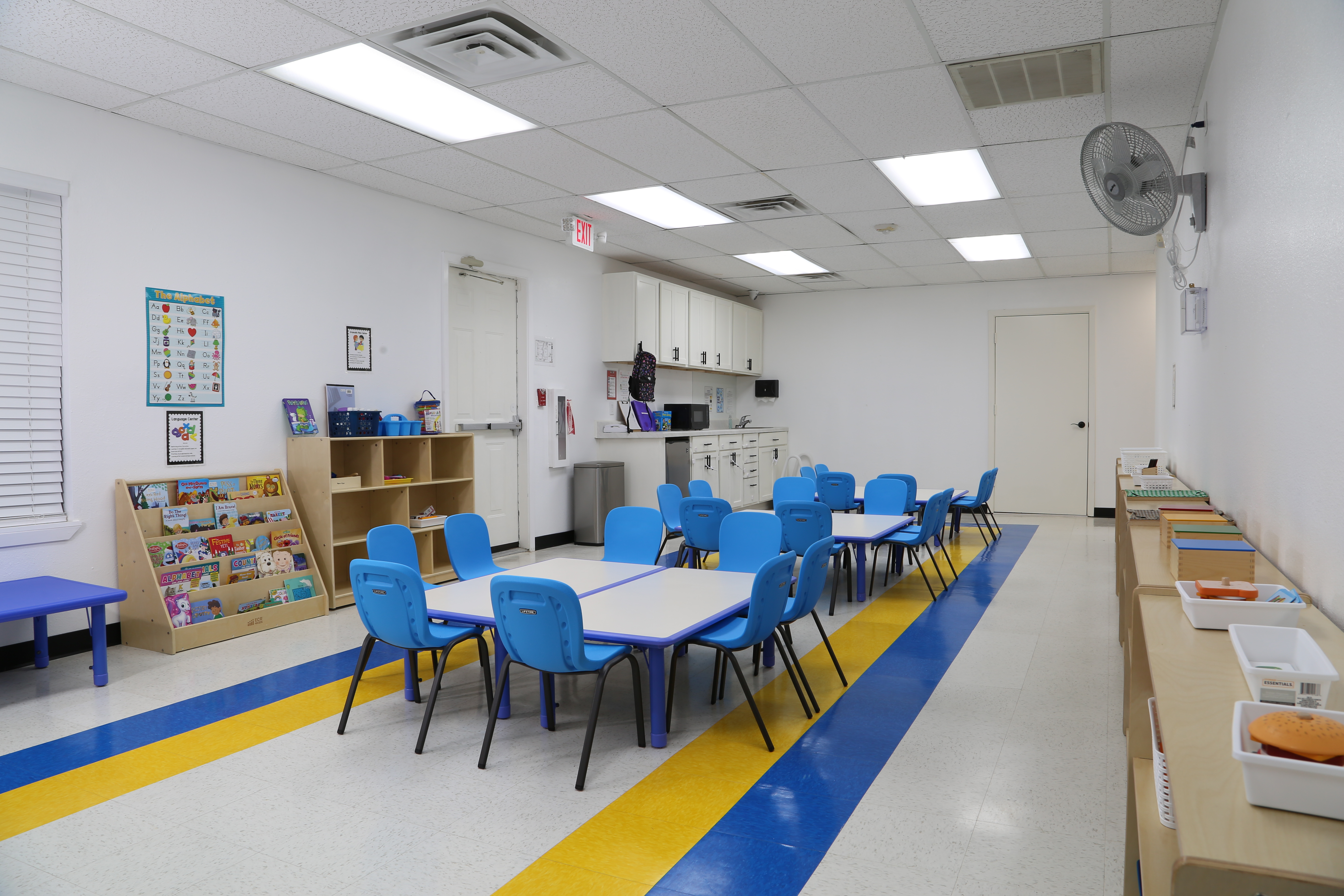 Bright Montessori classroom with curated learning materials at Kingsbridge Montessori
