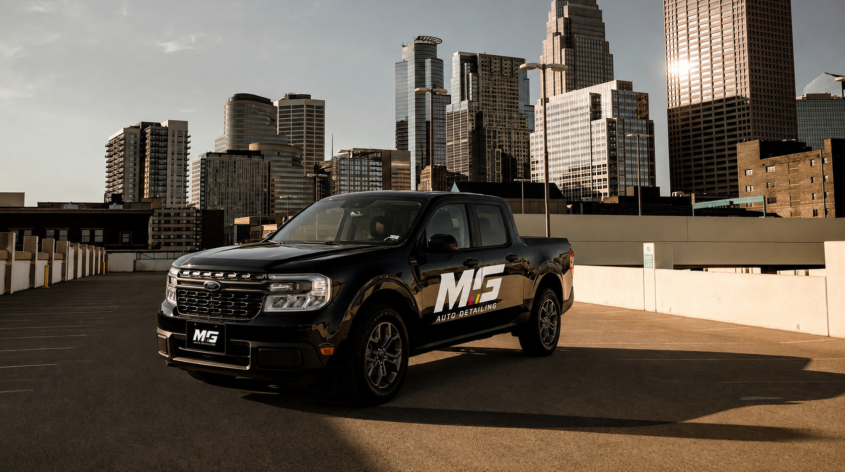 MG Auto Detailing mobile service truck with the Houston skyline