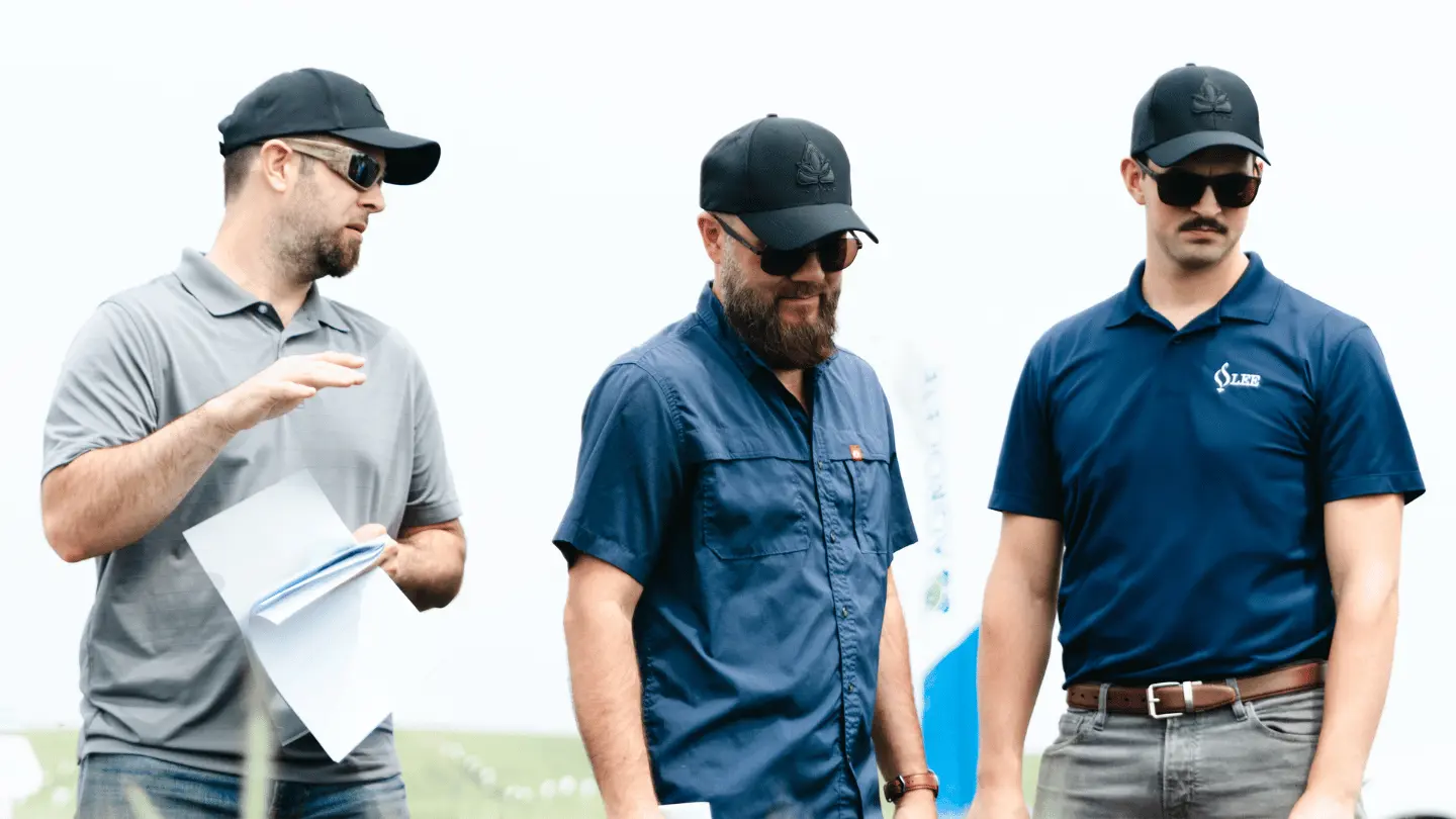 I&B Ag Supply team members discussing wholesale agricultural distribution