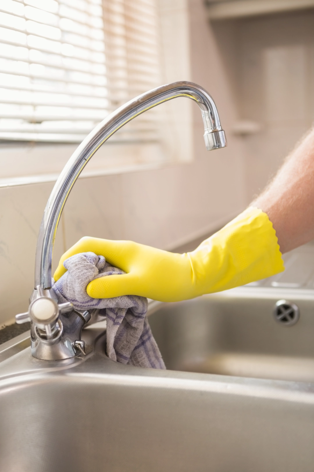 sink cleaning in a home in woodbridge by davis and davis facility services