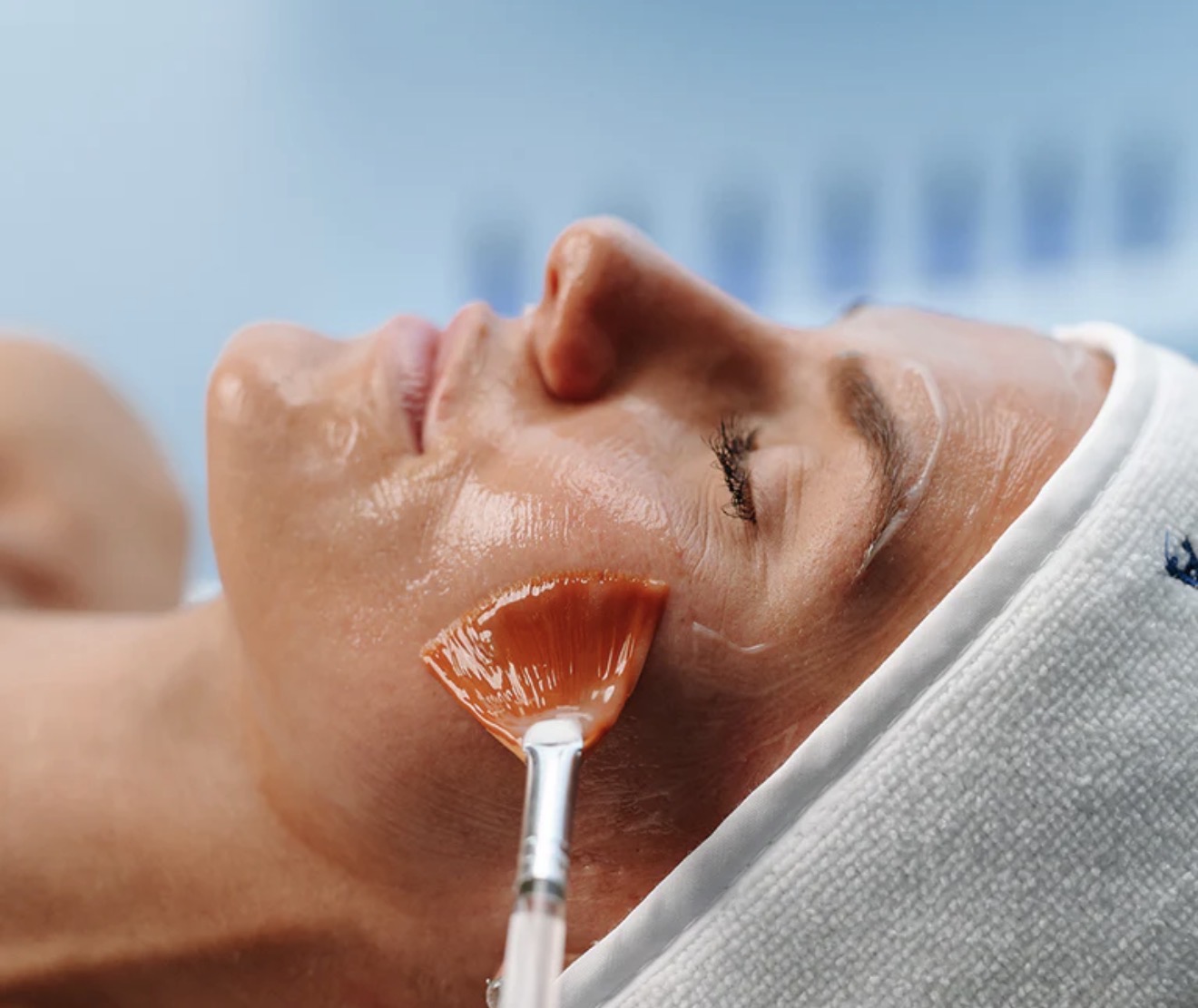 Woman with cooling mask being applied