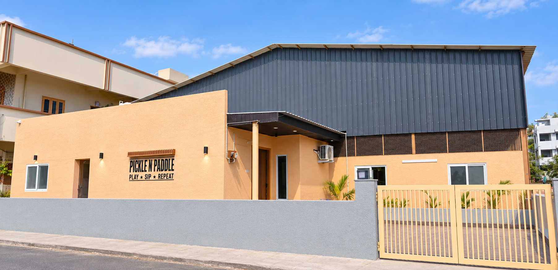 Pickle n Paddle venue entrance with gate in Maruthi Nagar, Kurnool