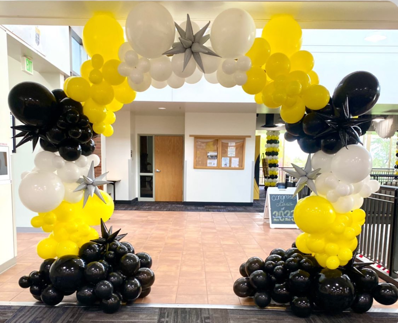 Bee themed balloon arch