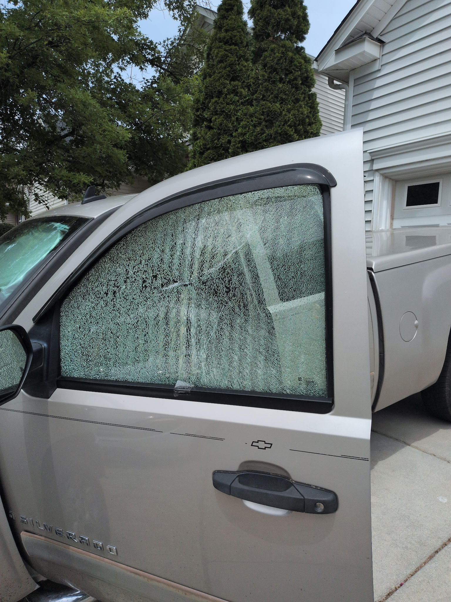 Chevy Silverado with broken driver-side window