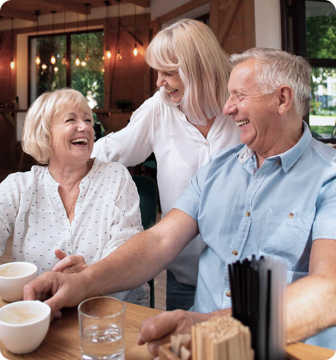 Loan officer reviewing reverse mortgage options with clients