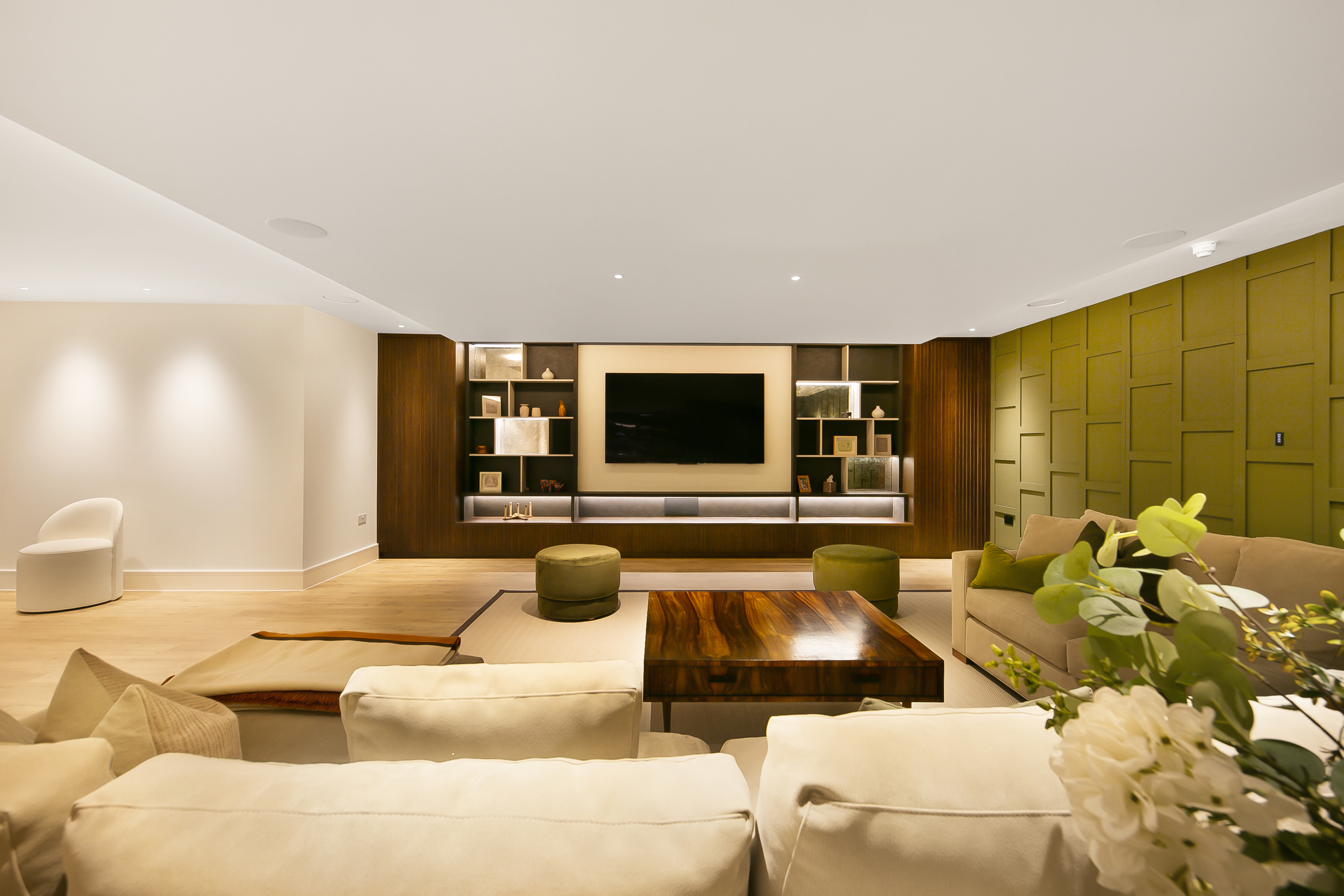 Luxury living room with garden views photographed for a London property listing
