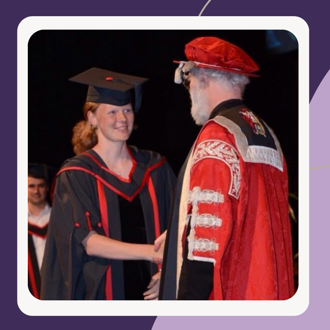 Laura graduating university with a Masters of Chiropractic 