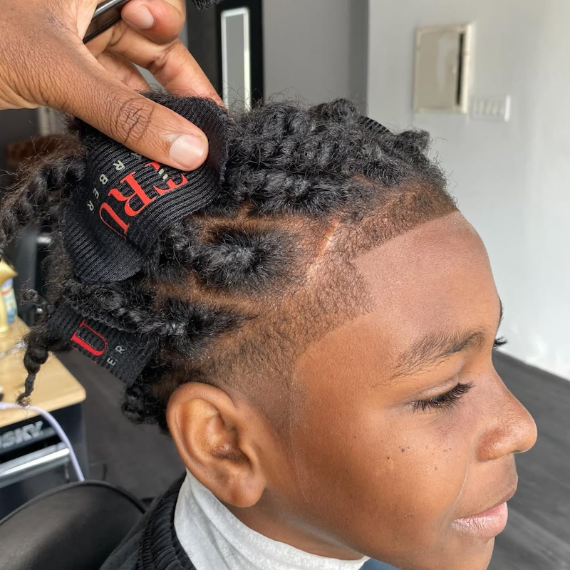 Kid with twisted locs lineup