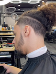Low bald fade with man bun