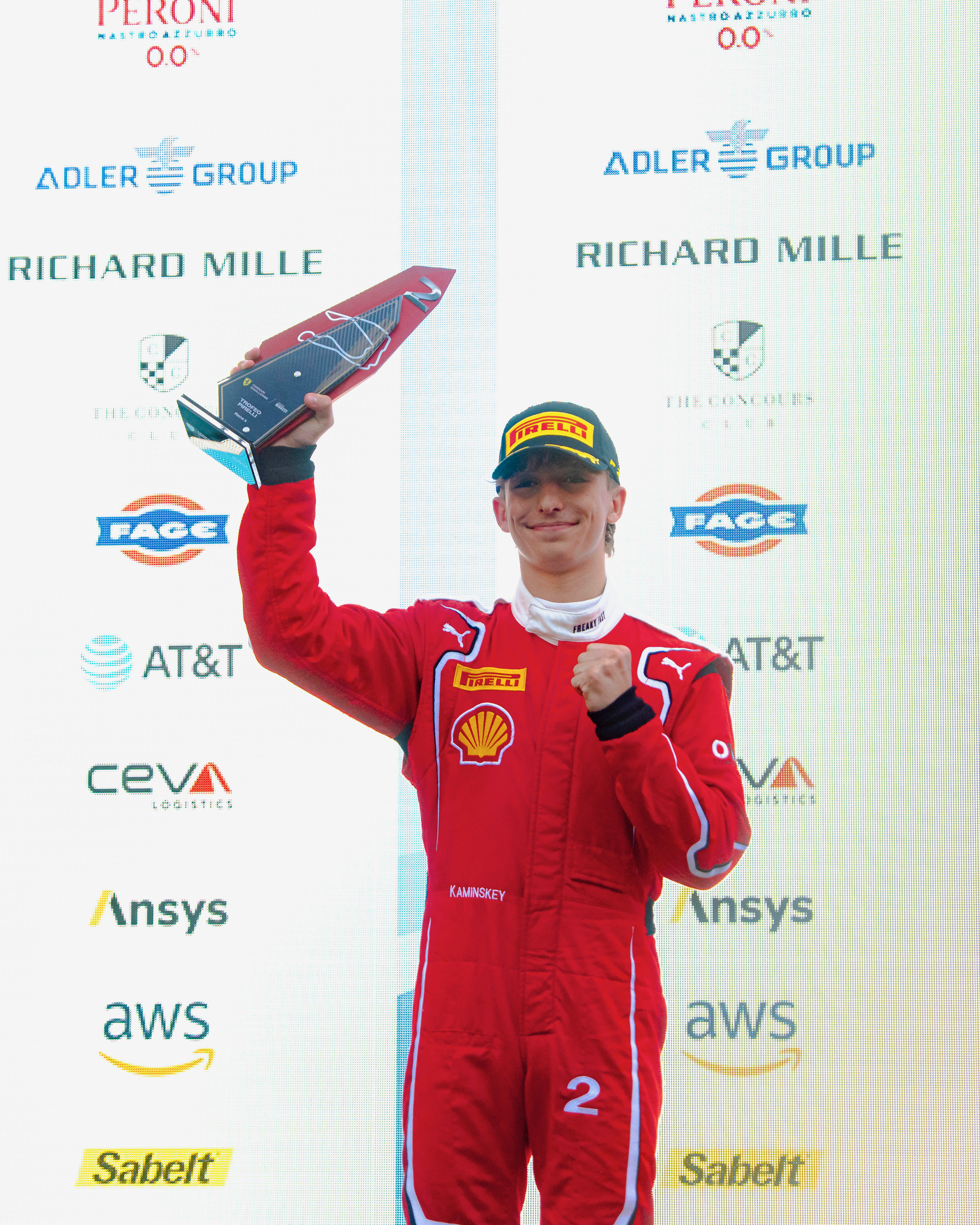 Johnny Kaminskey on podium with trophy during Ferrari Challenge Event after Race