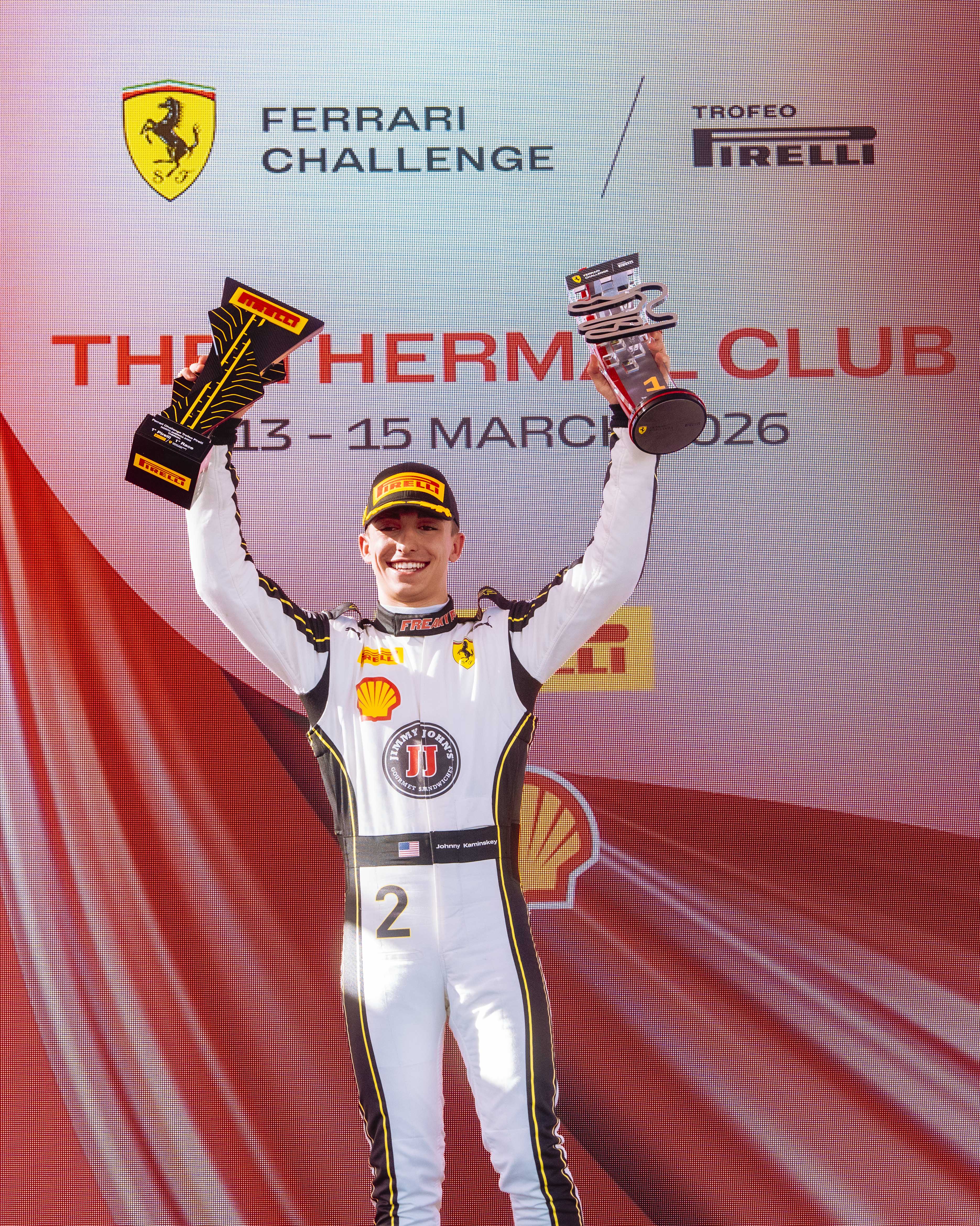 Johnny Kaminskey on podium with trophy during Ferrari Challenge Event after Race With 1st Place Trophy