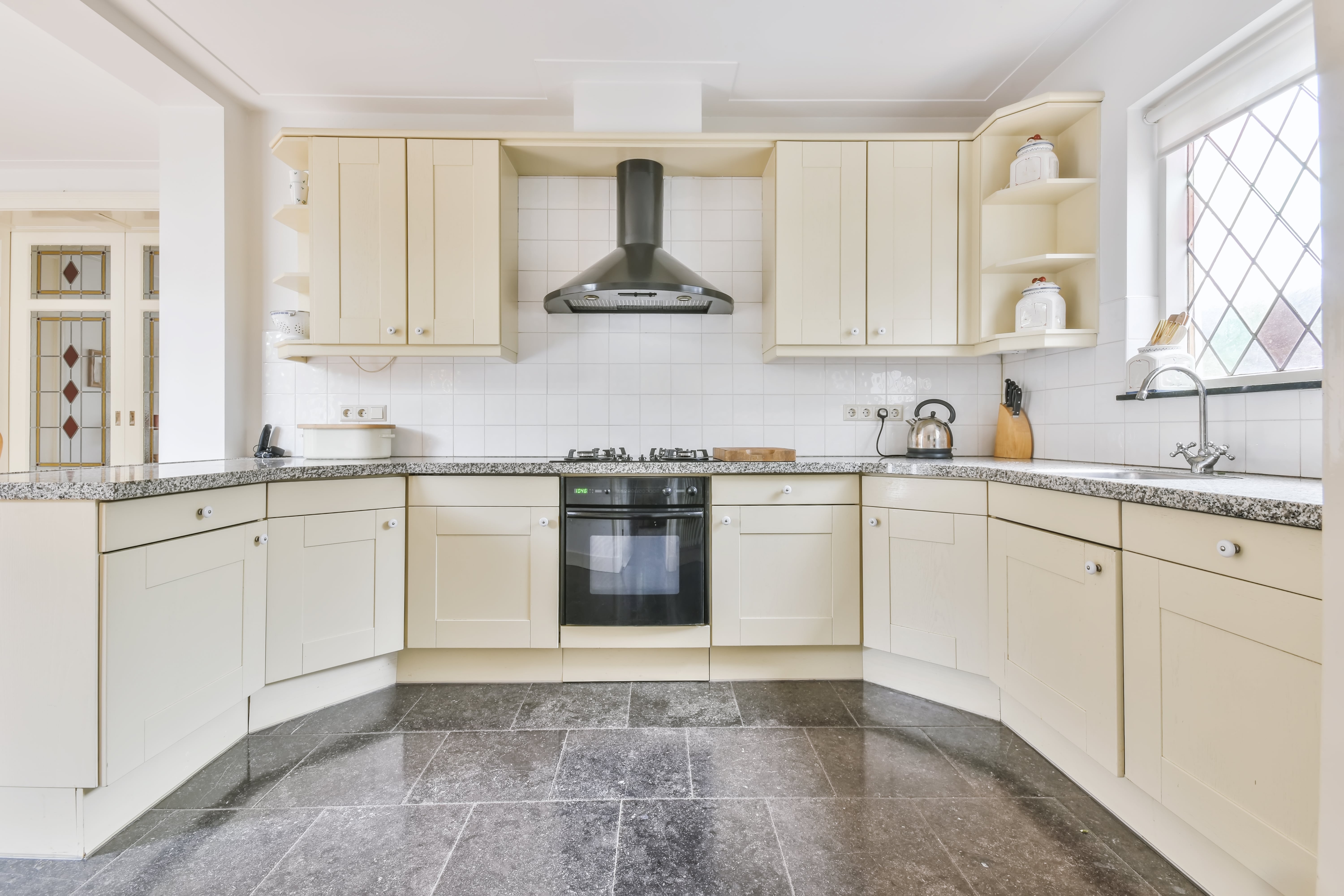 Tiled Kitchen Floor, Splashback, and countertop