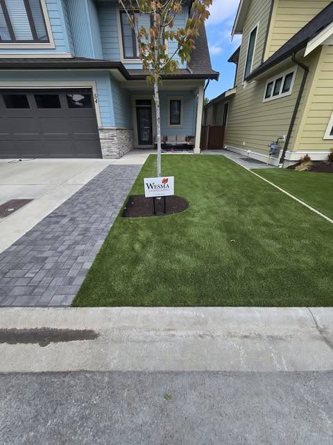 Finished Wesma front-yard artificial turf with yard sign