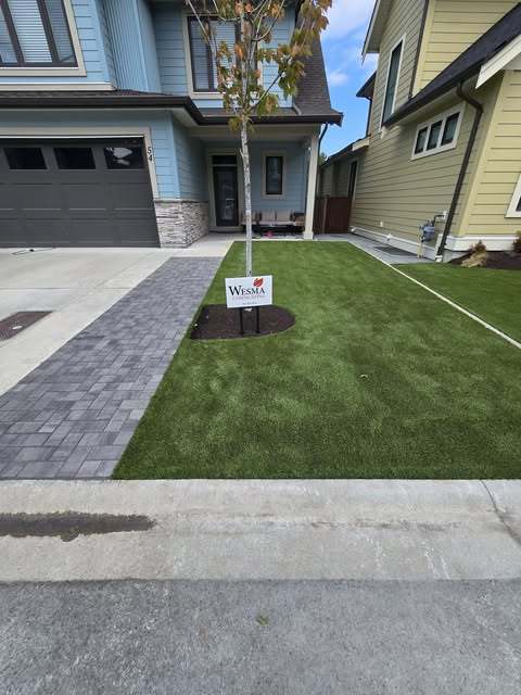 Finished Wesma front-yard artificial turf with yard sign