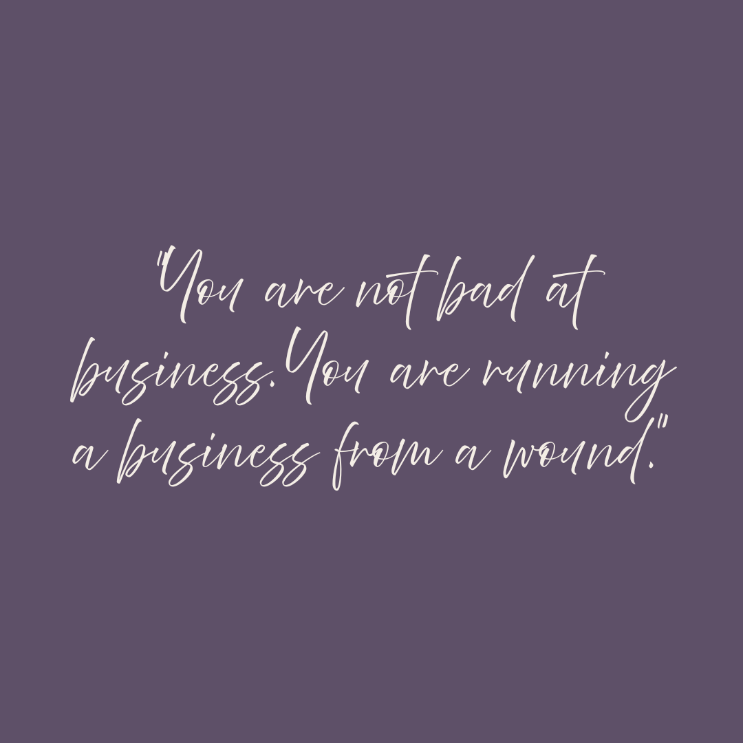 Quote graphic in soft plum with elegant script font reading: You are not bad at business. You are running a business from a wound. From the Prostitution Wound series by Suzi Soul Alchemist. Quote graphic in soft plum with elegant script font reading: You are not bad at business. You are running a business from a wound. From the Prostitution Wound series by Suzi Soul Alchemist.
