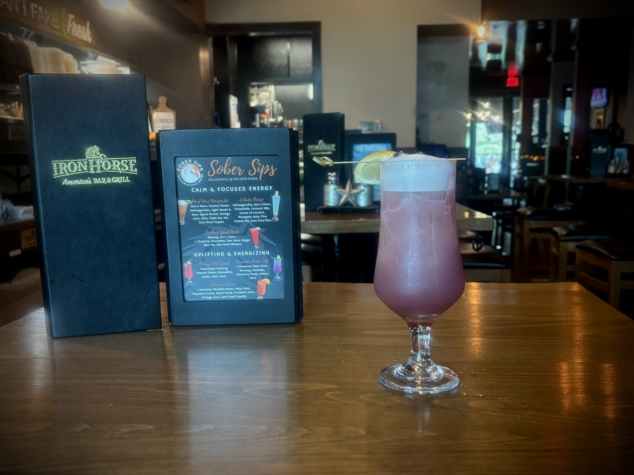 Floral lavender and citrus mocktail with blueberry, infused with adaptogens for a gentle energy lift and balance.
