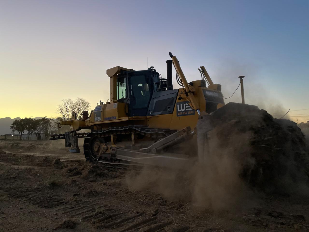 Bulldozer moving soil during MM22 earthworks
