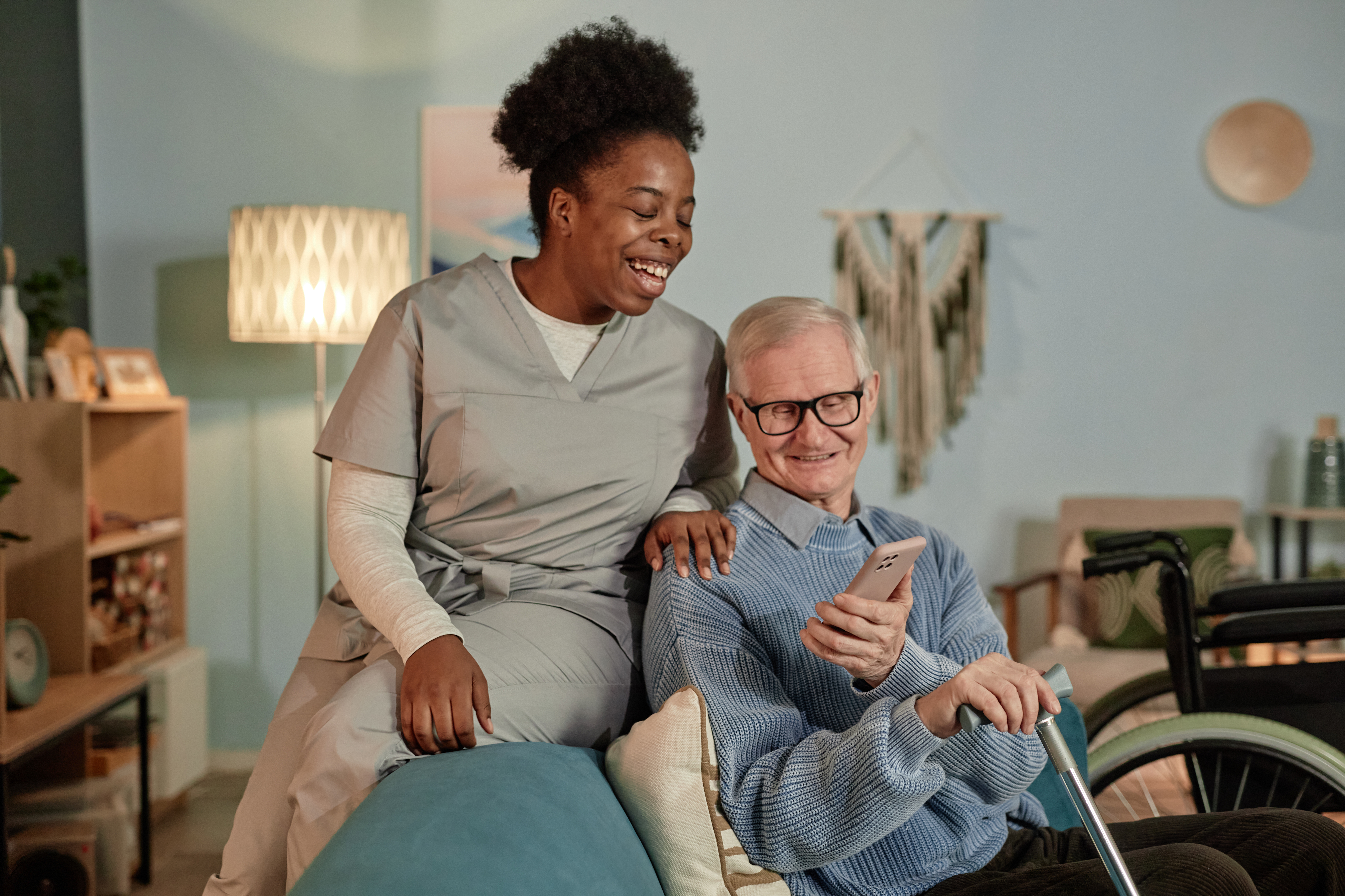Warmth caregiver providing warm, attentive care to an older adult