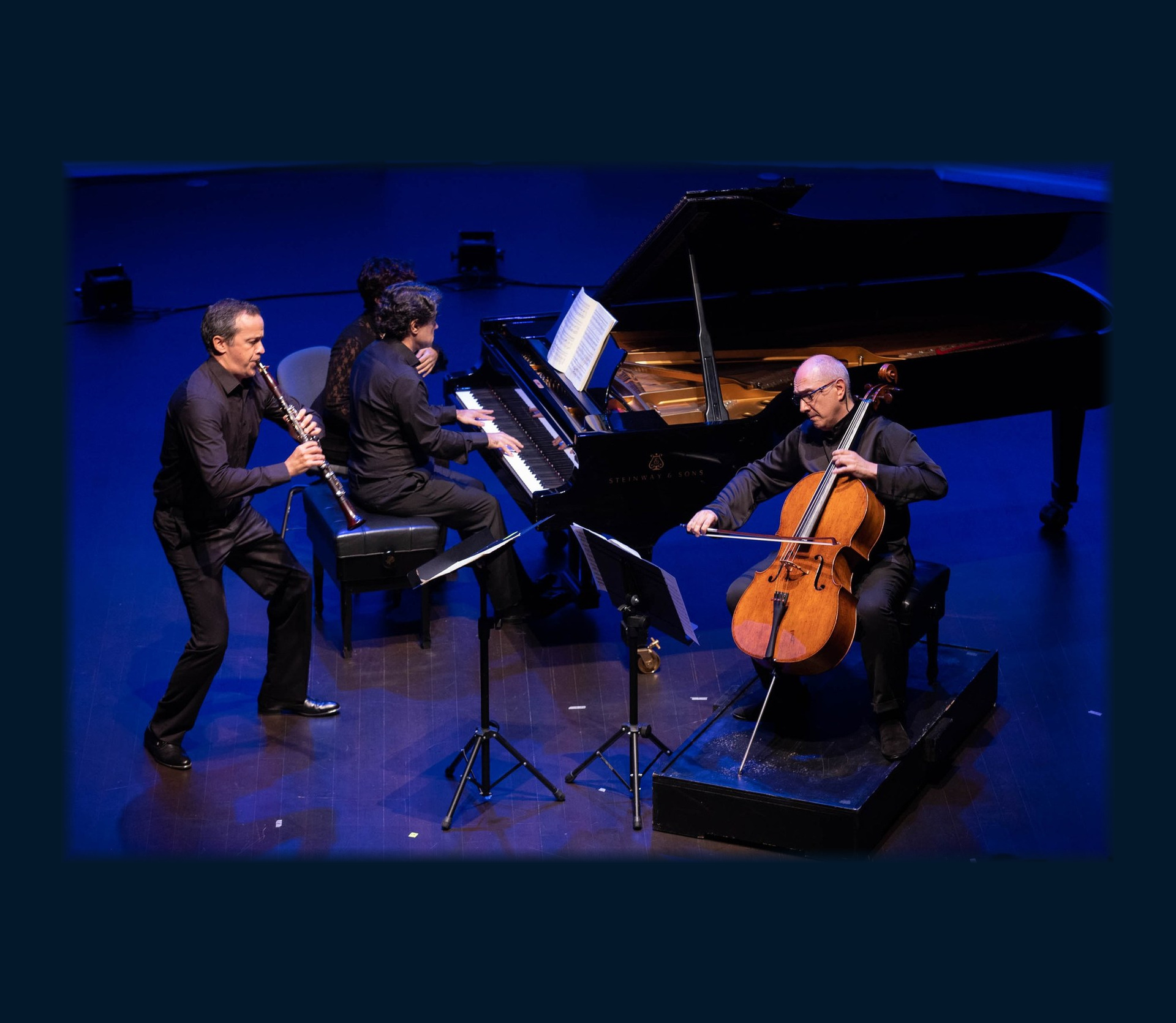 Cristo Barrios performing chamber music with piano and cello