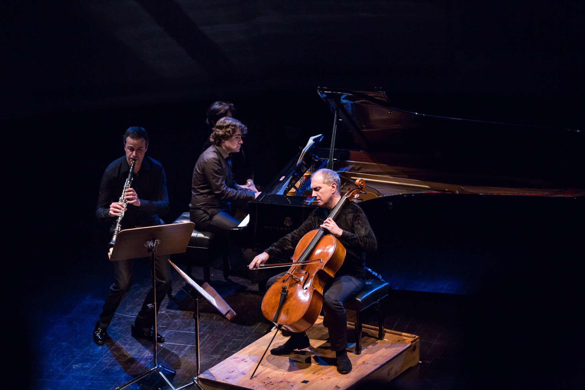Cristo Barrios performing chamber music with piano and cello