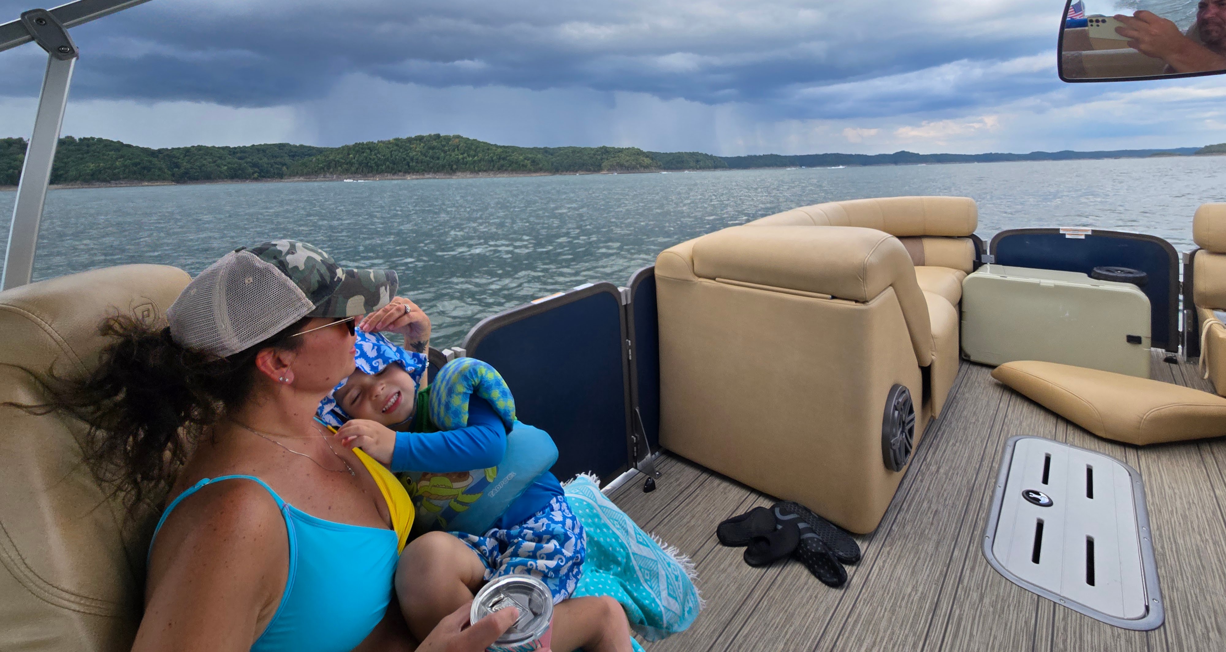 Kid on a boat in a storm Lake Cumberland