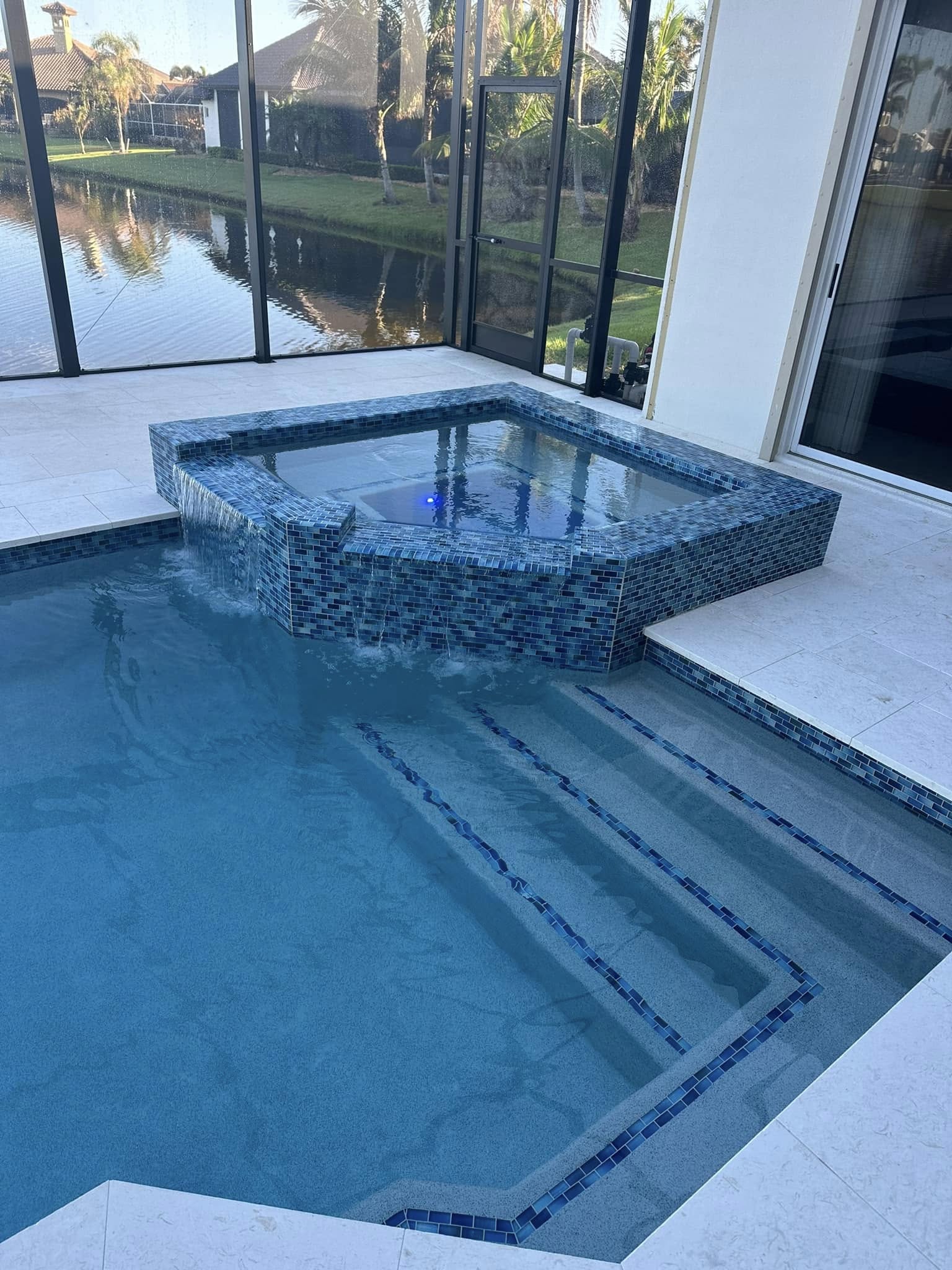 Remodeled backyard pool and spa in Fort Myers