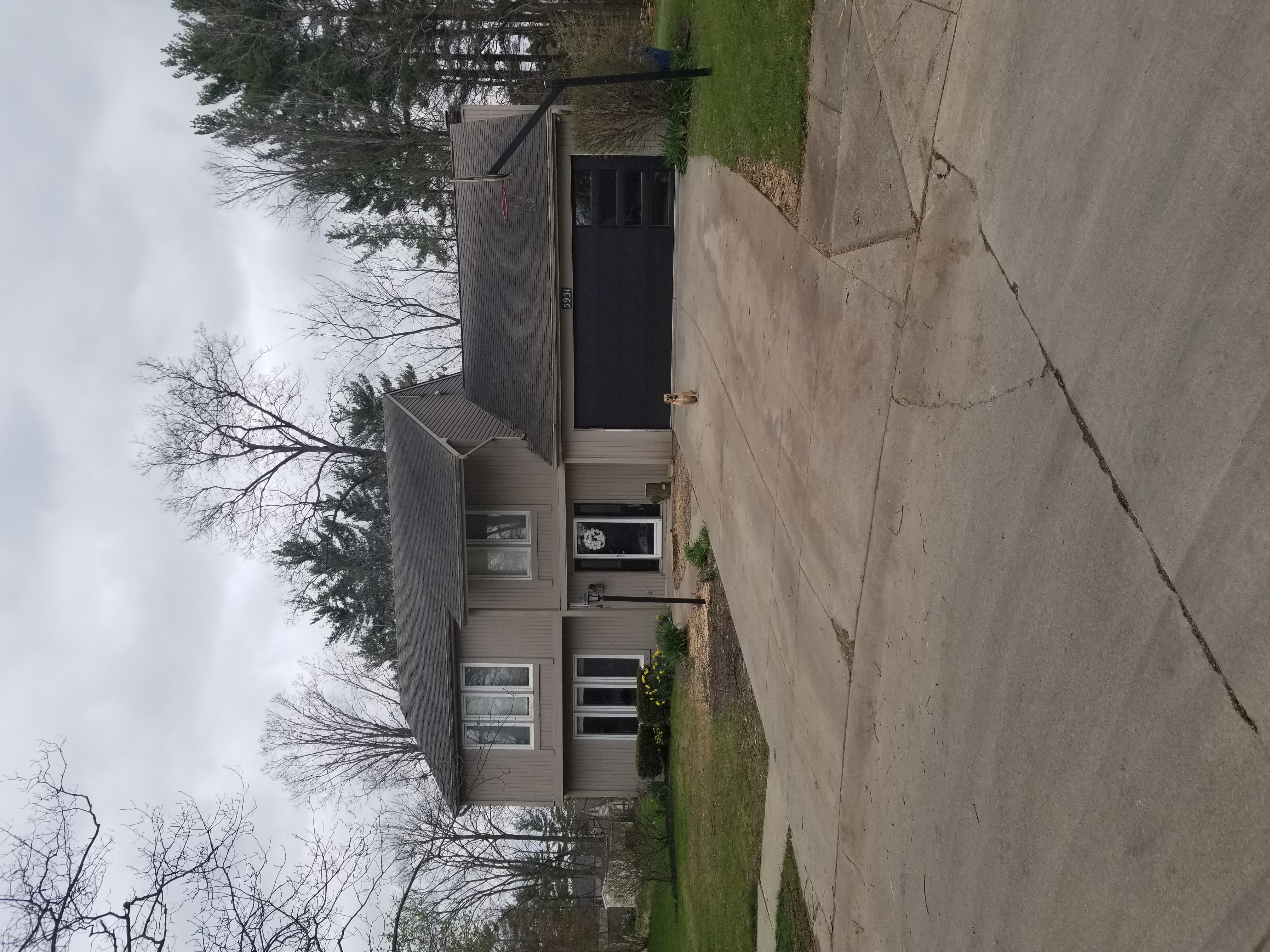 Two-story home before repainting