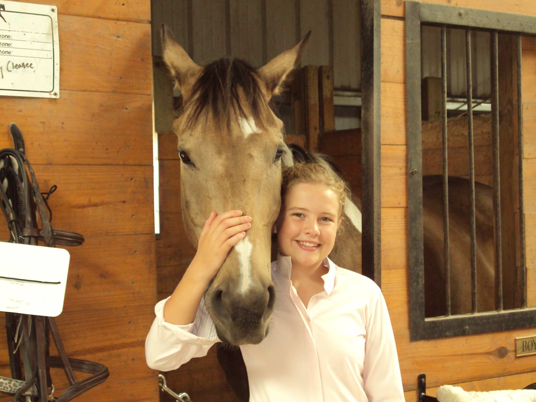 Lily caring for animals, focused on nurturing rather than competition