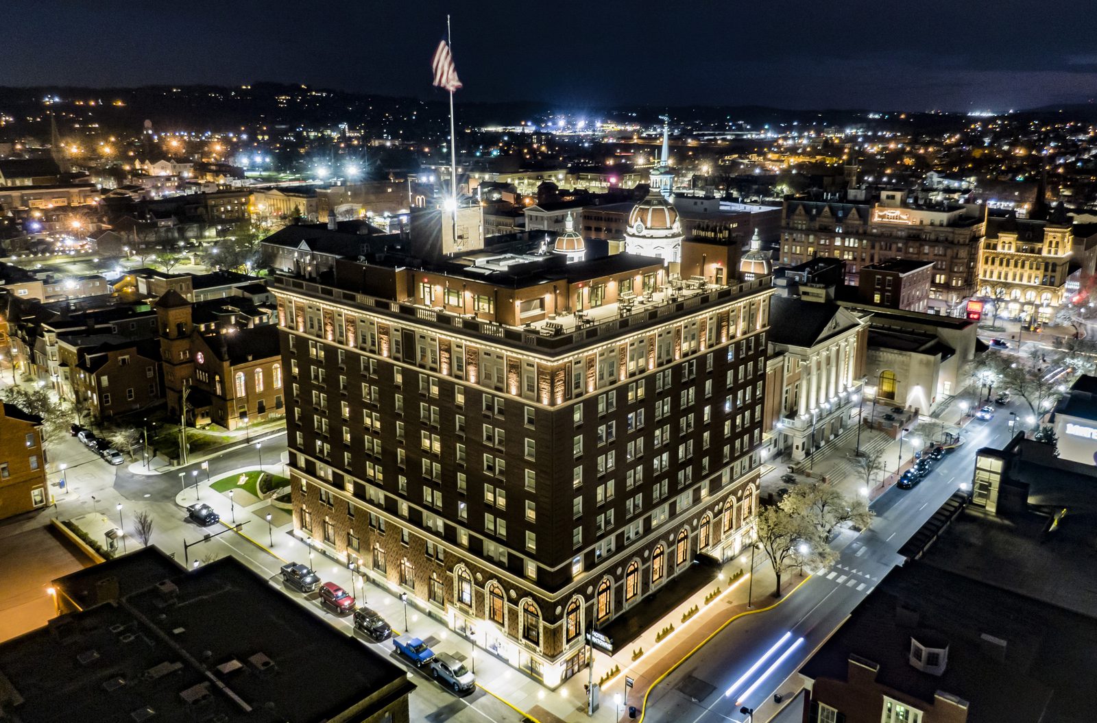 Aerial night photo of the Yorktowne Hotel facing the York County Courthouse in downtown York