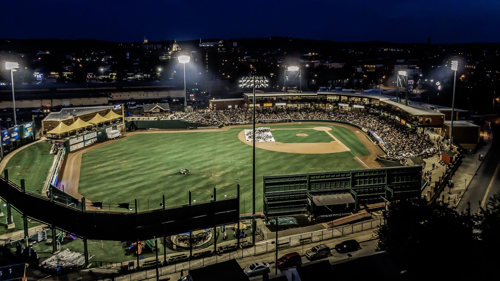 Aerial night photo of WellSpan Park lit up during a York Revolution game