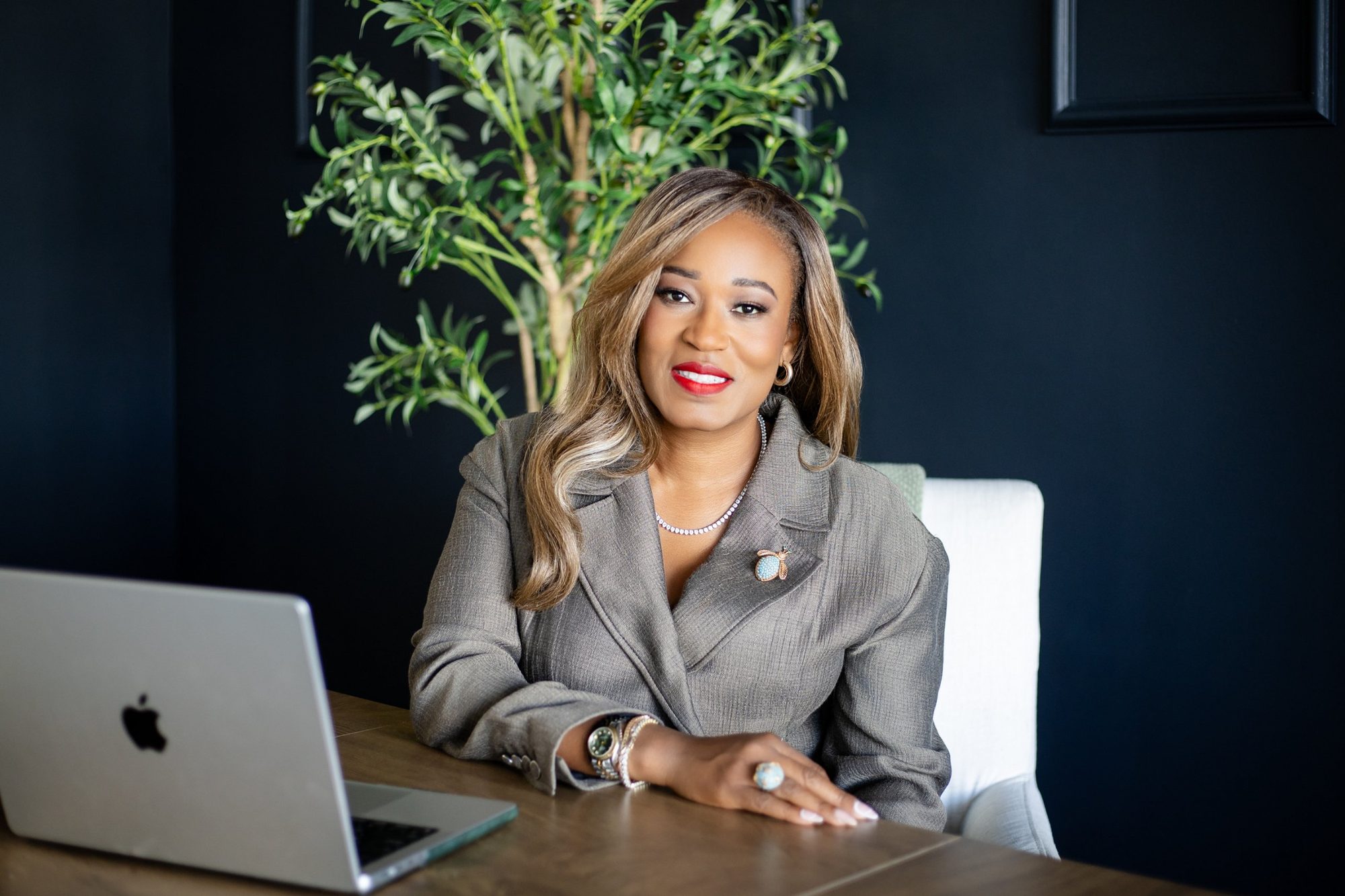 Monique D. Hayes at her desk