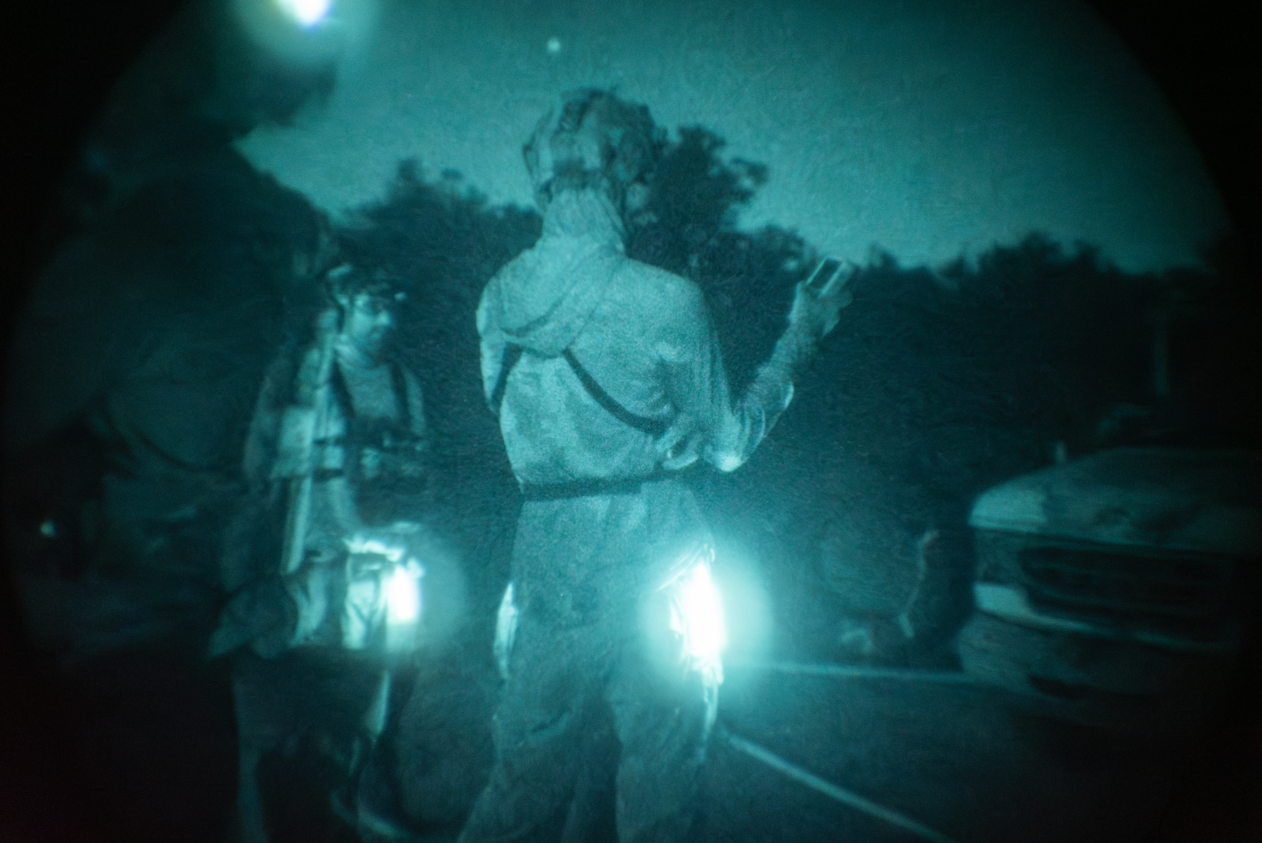 Shooters under night vision at Saturday Night Blackout