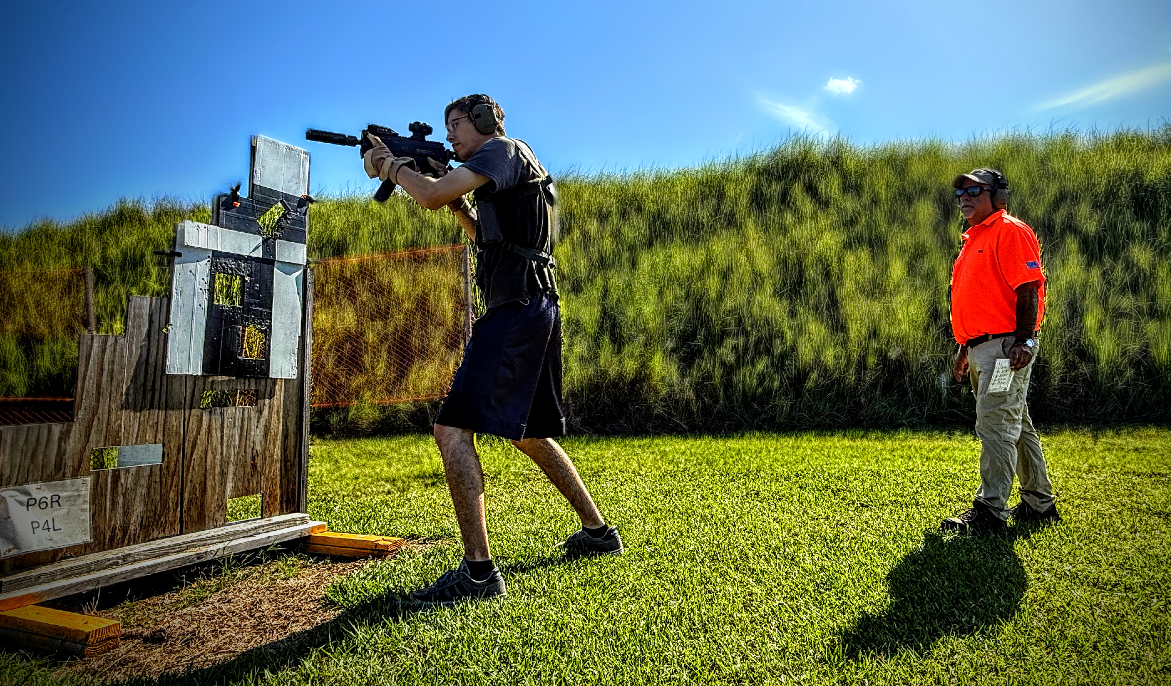 Shooter engaging targets on the Pistol Challenge Course