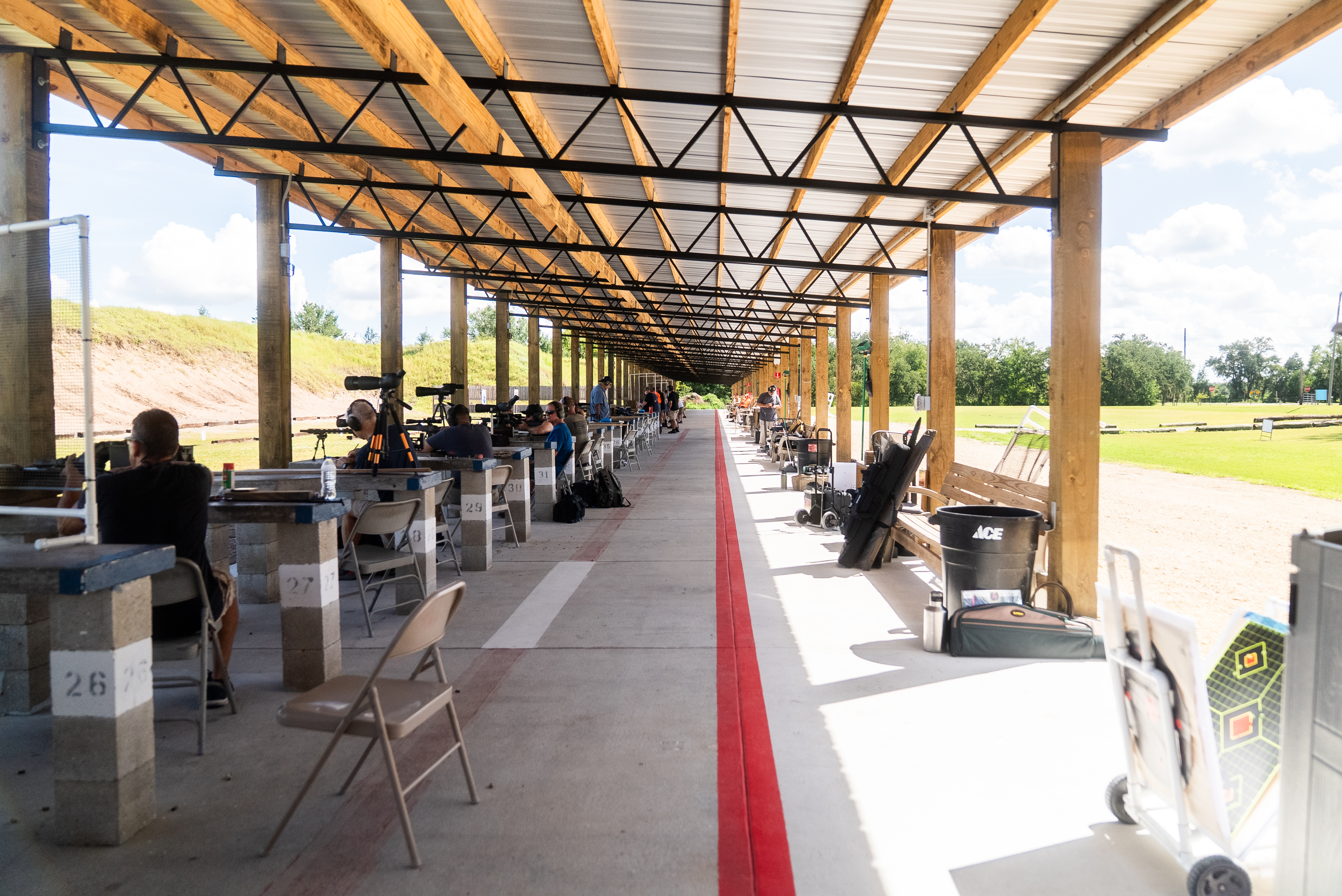 Covered main firing line at MGAC with numbered benches