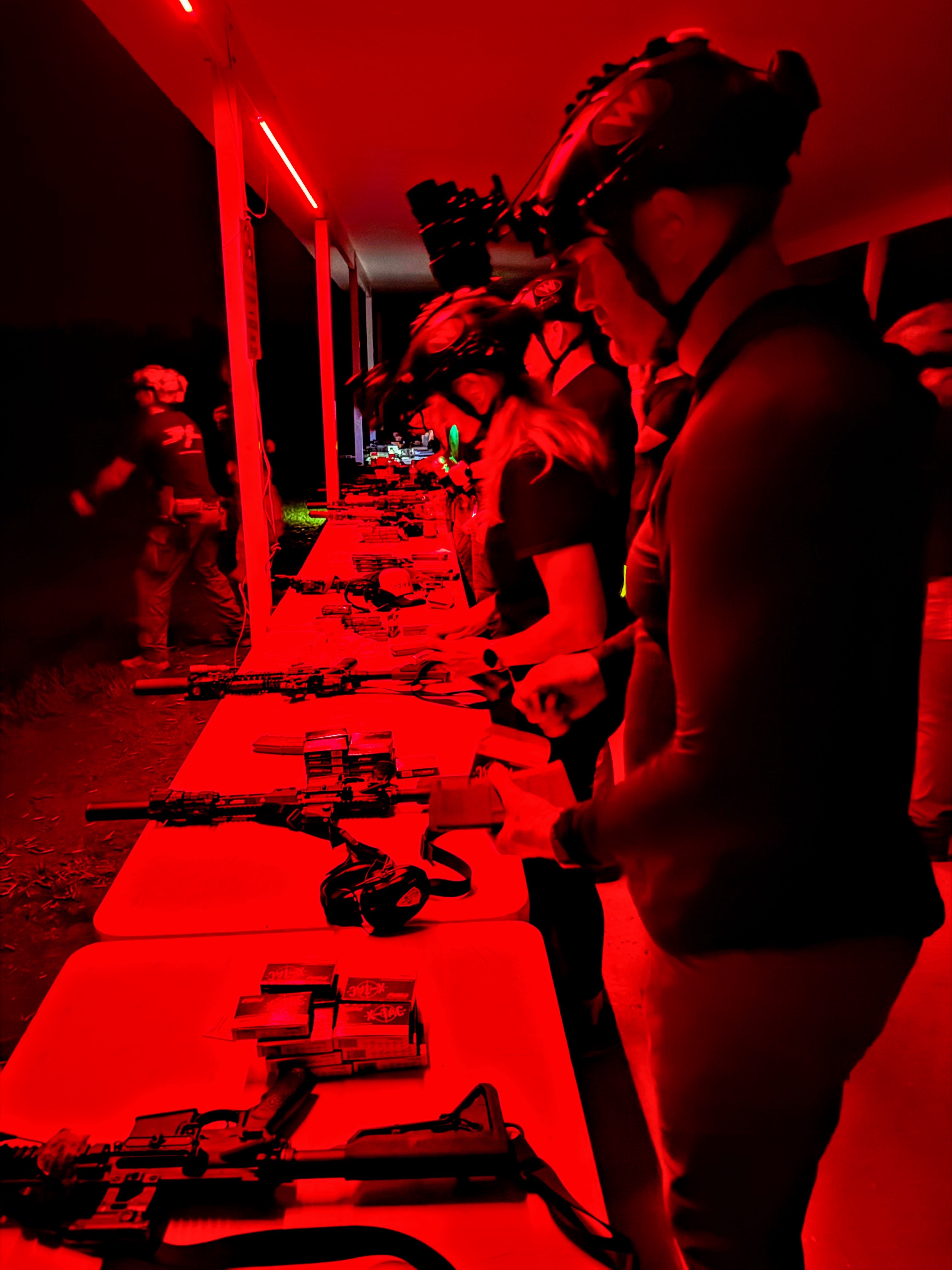 Night Ops event under red light at MGAC