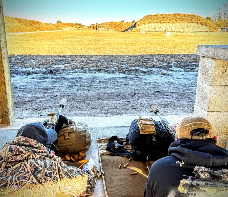 Shooters set up at the long-range firing line
