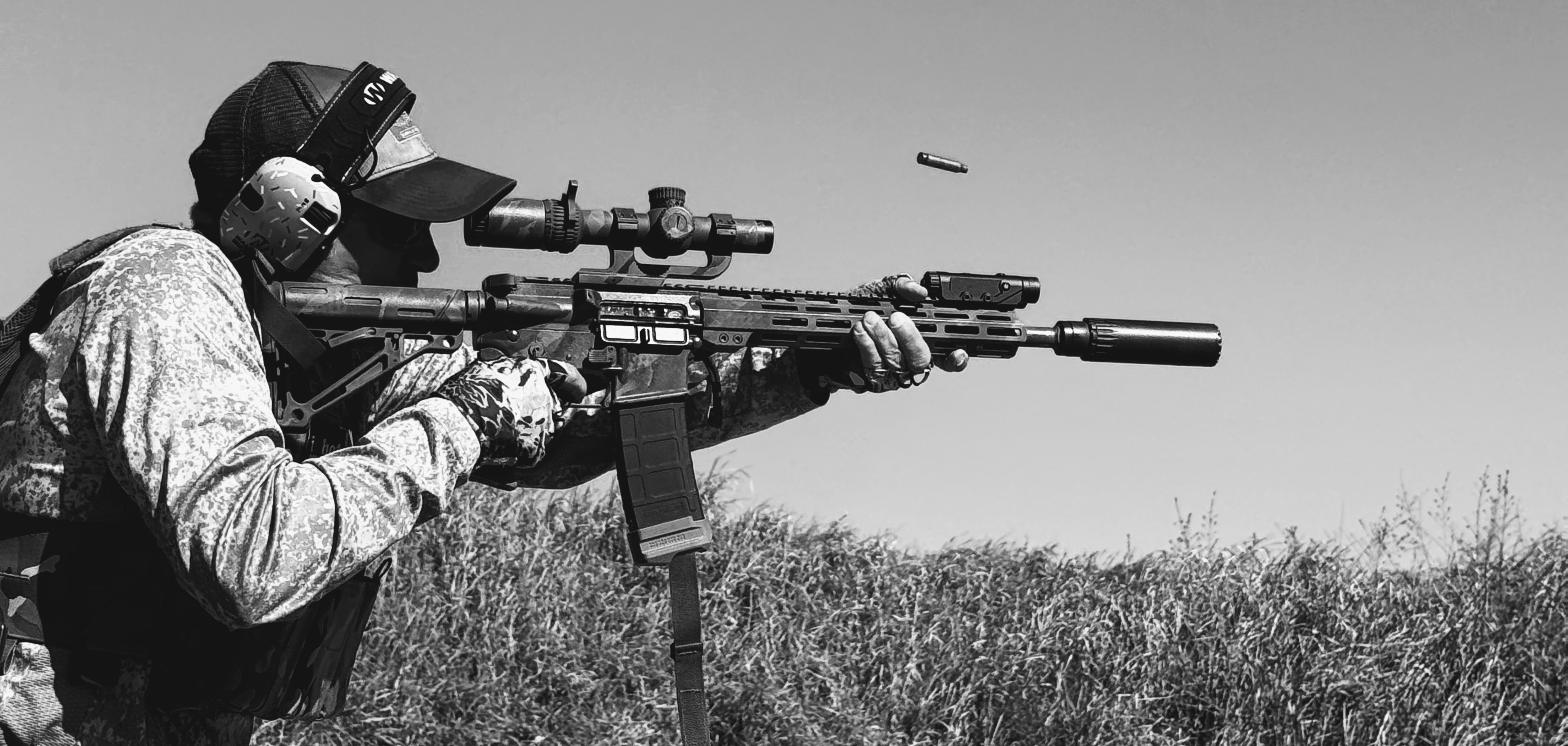 Rifle shooter firing from standing on the MGAC action bays