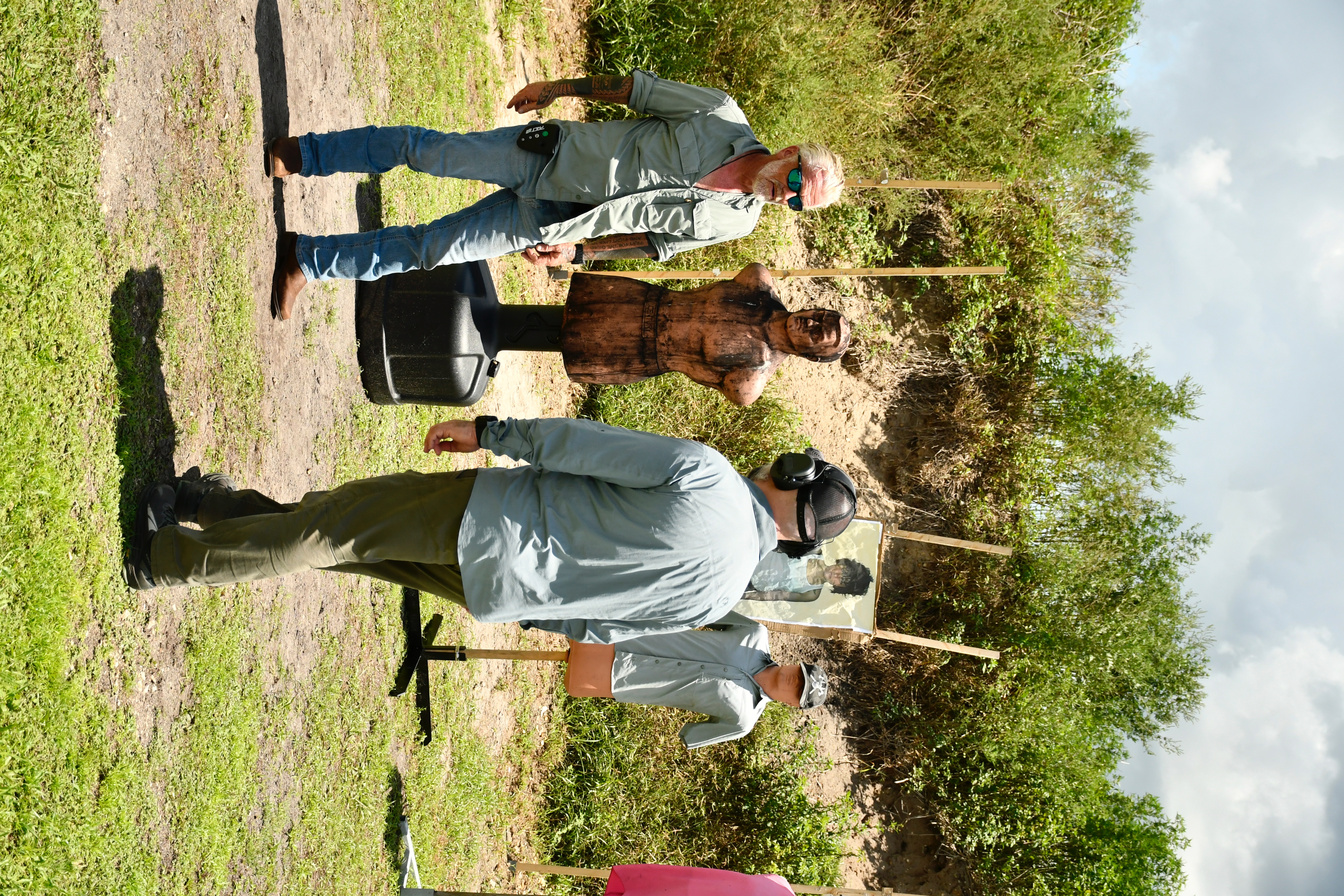 Go Noisy instructor and participant at an outdoor training range
