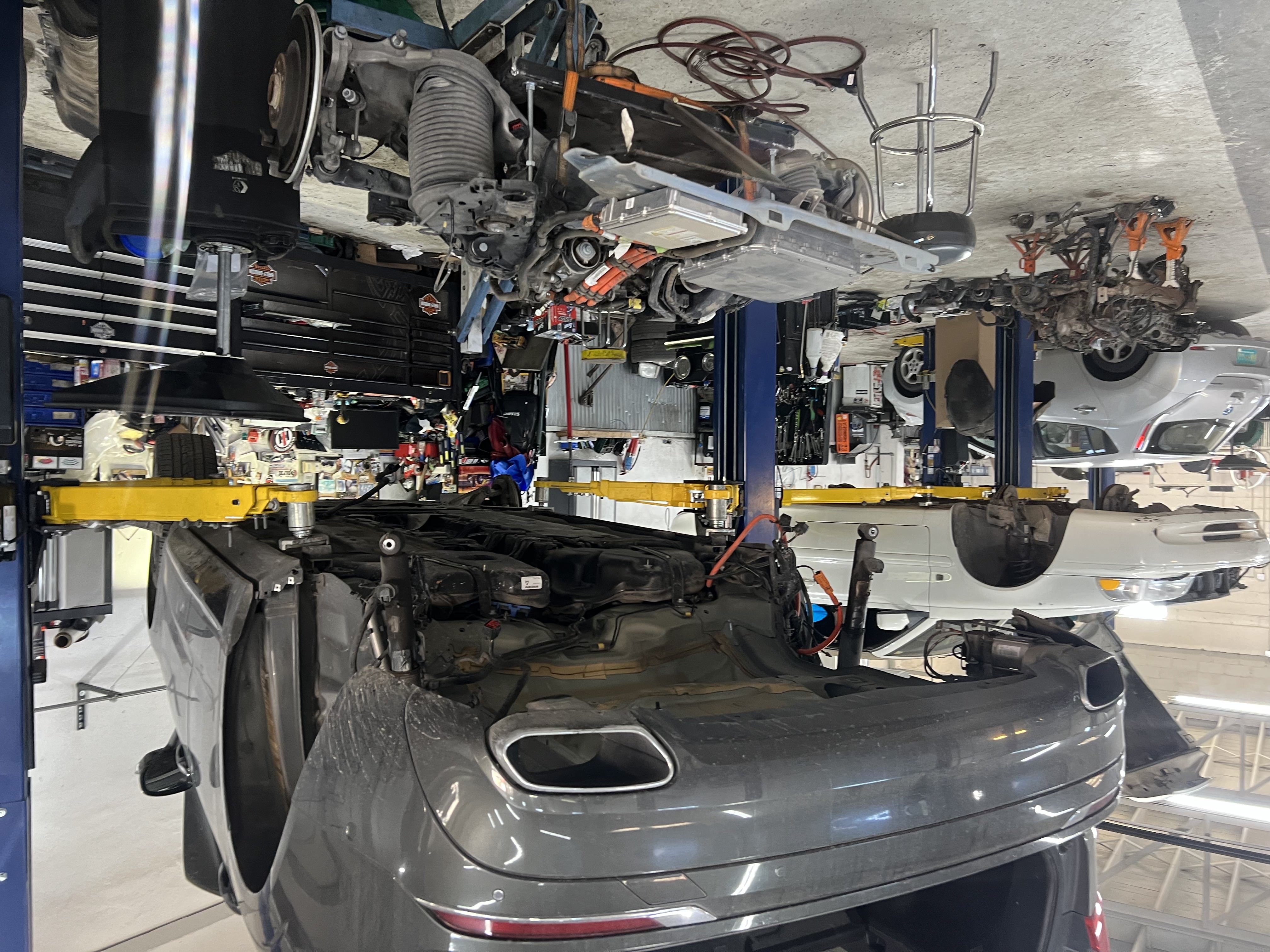 Volvo ERAD Motor pulled out from vehicle and on a pulley