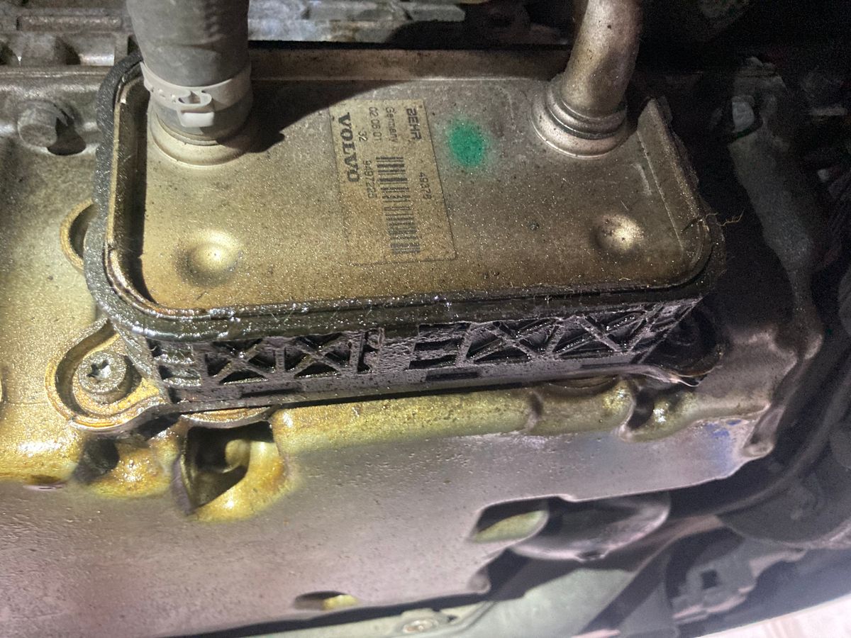 Volvo oil cooler with seal failure indicating need for replacement