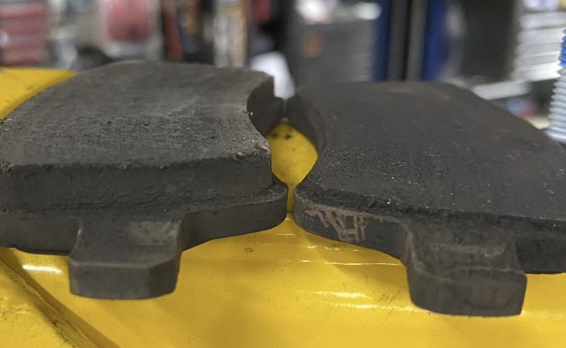 Volvo Brake pads, one with a low measurement, one with a adequate measurement