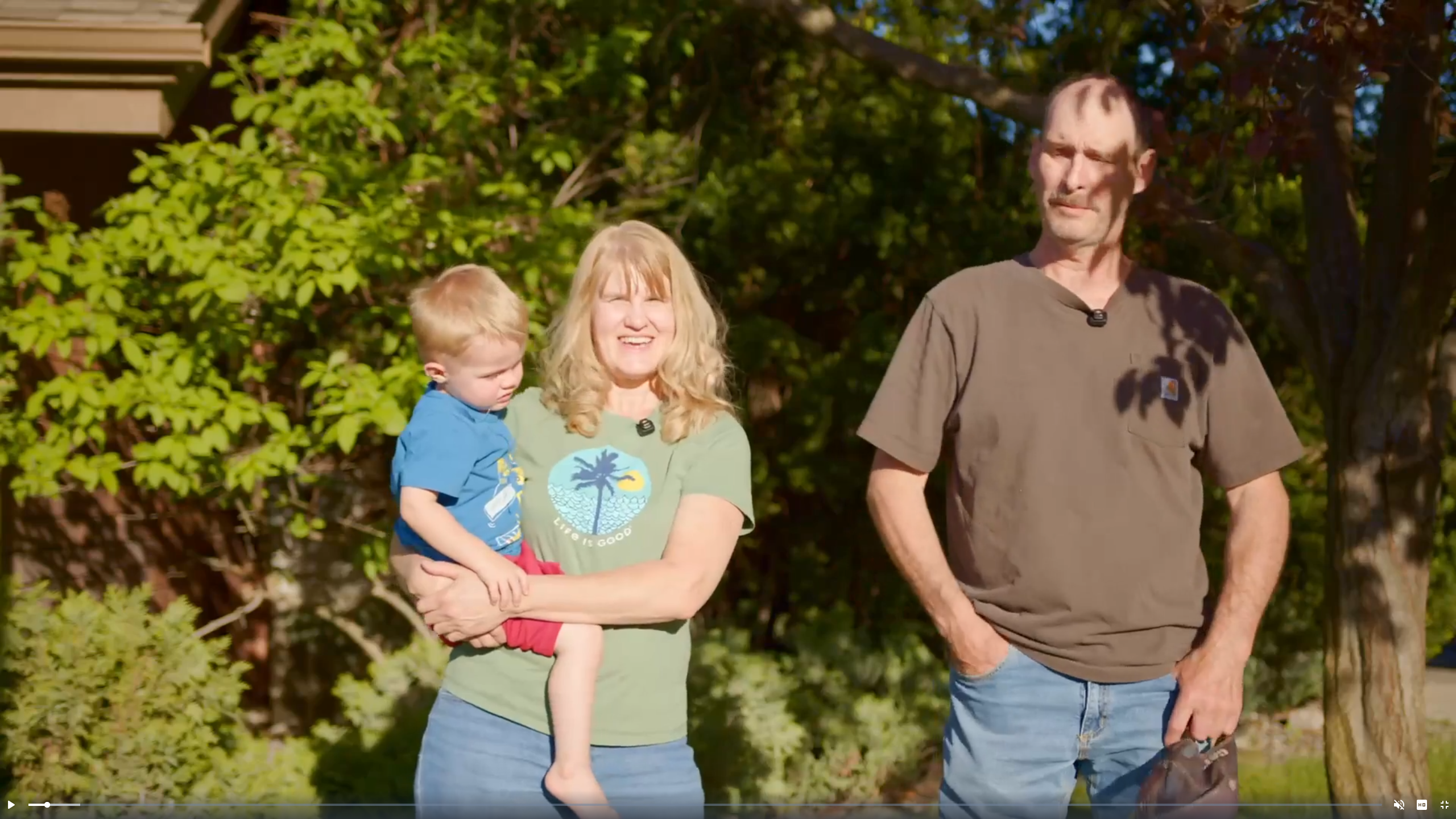 10-Days to Health student testimonial — Tawne holding her grandchild with Shawn after his stroke recovery