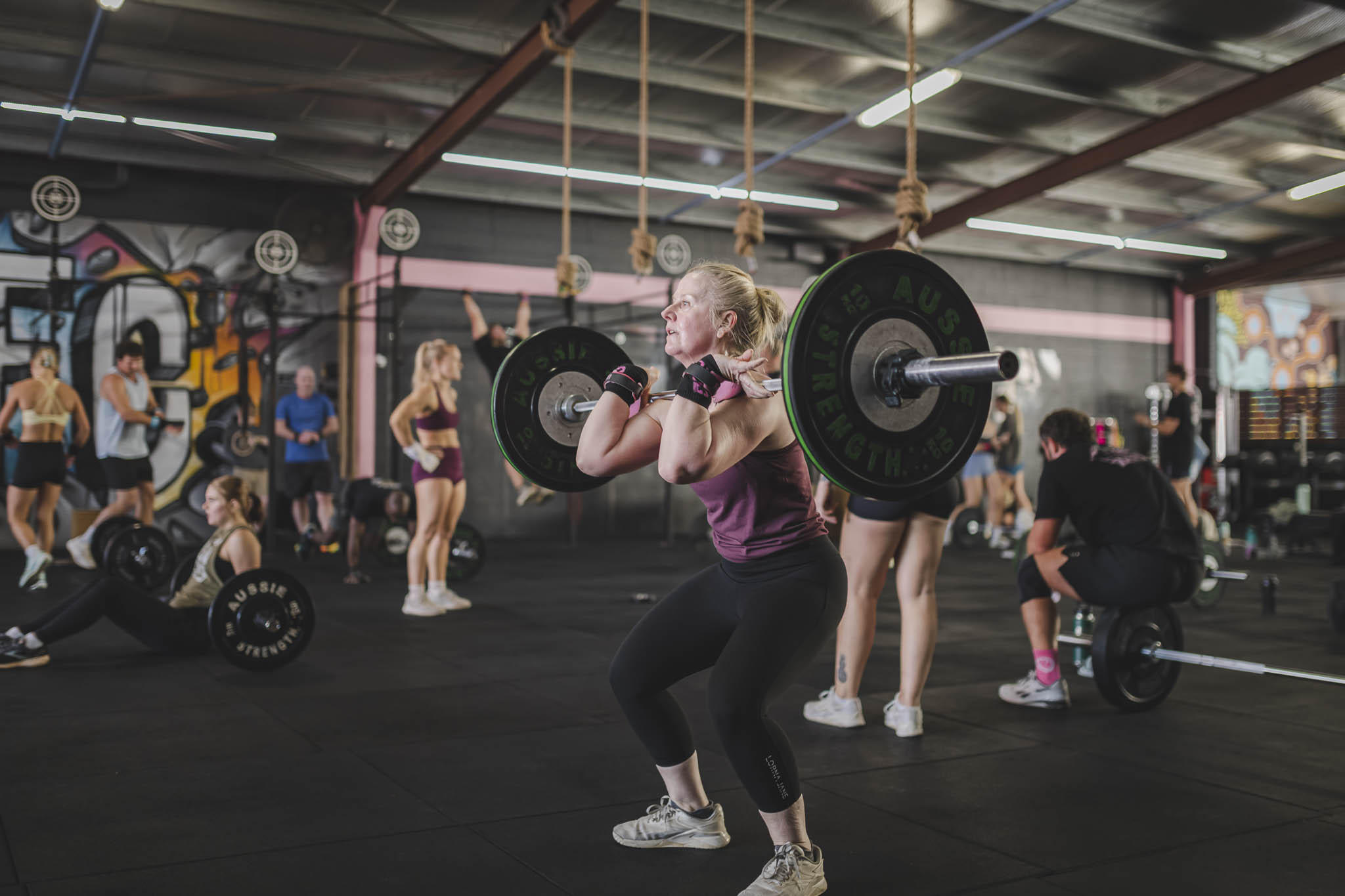 Front squats in a coached class