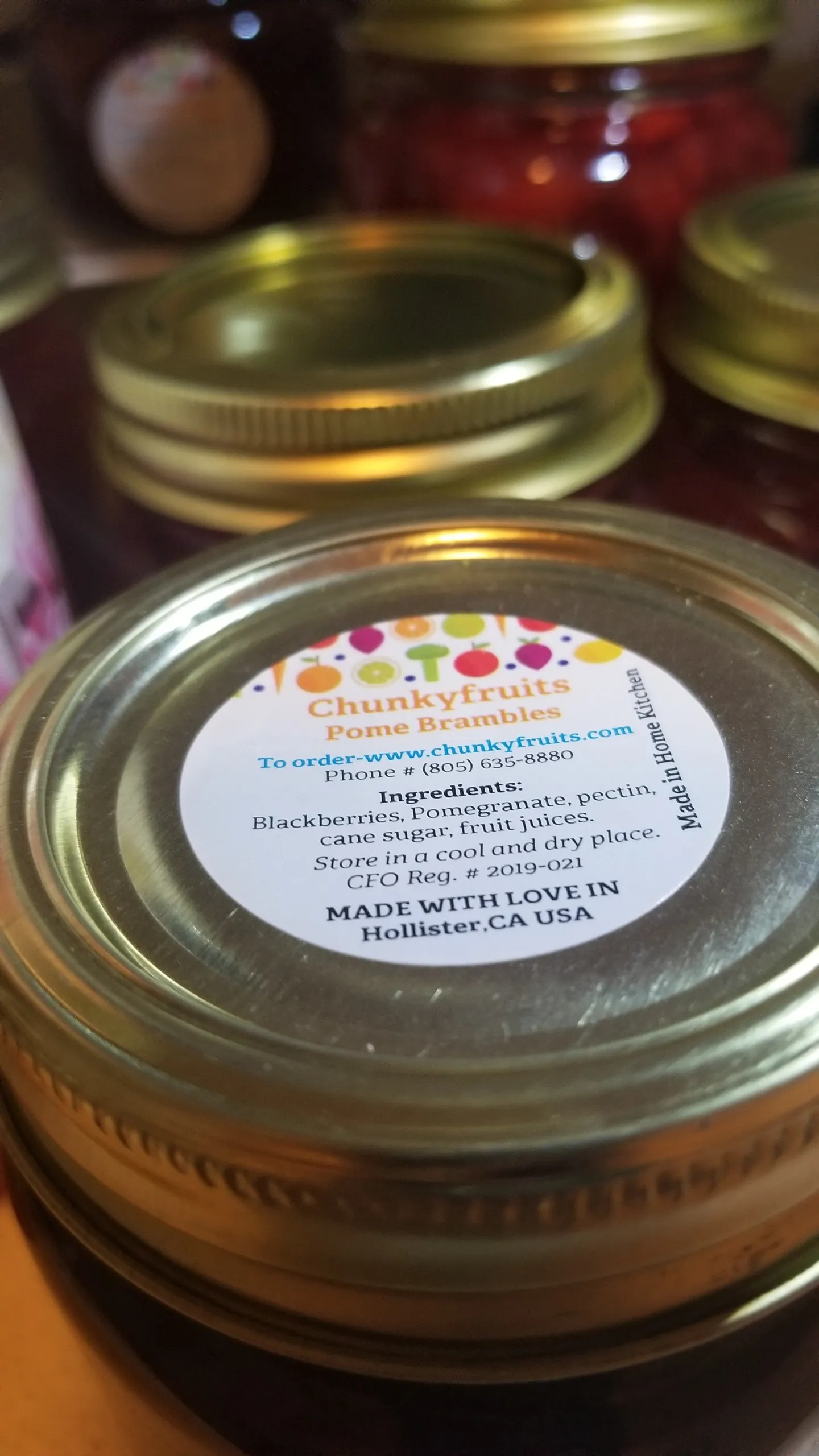 Labeled Pome Brambles blackberry and pomegranate jam jar