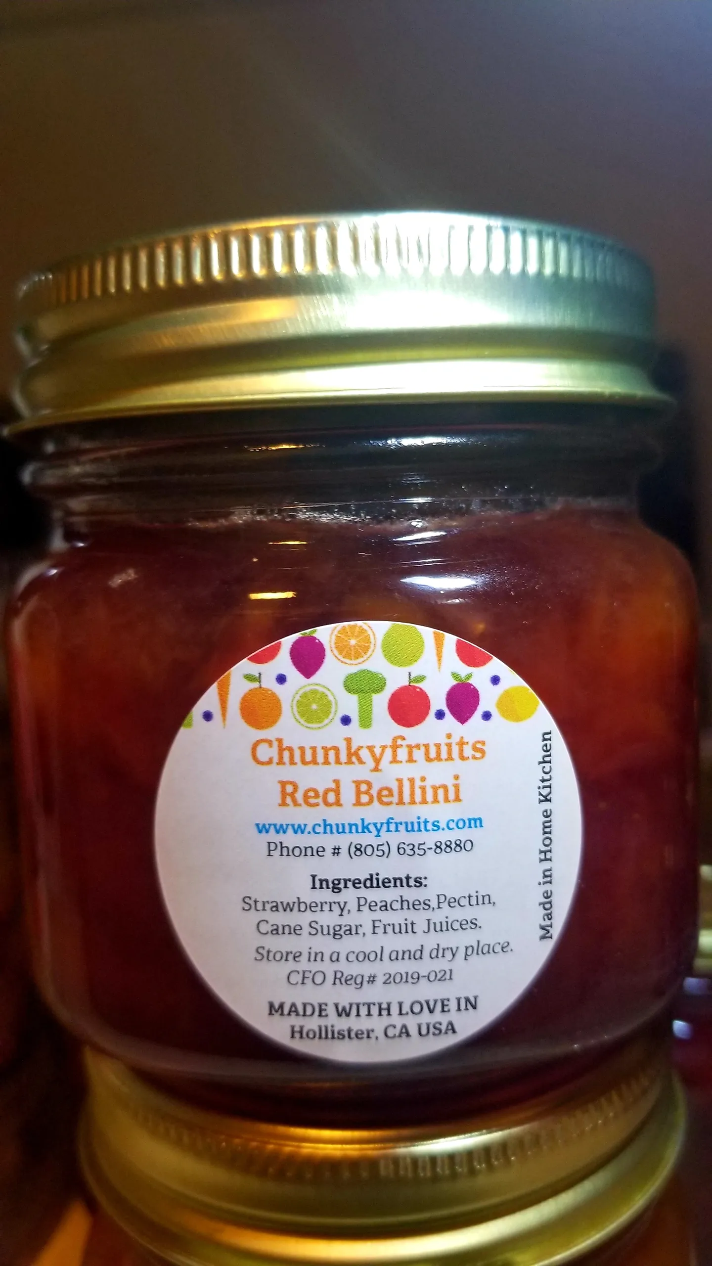 Labeled Red Bellini strawberry and peach jam jar