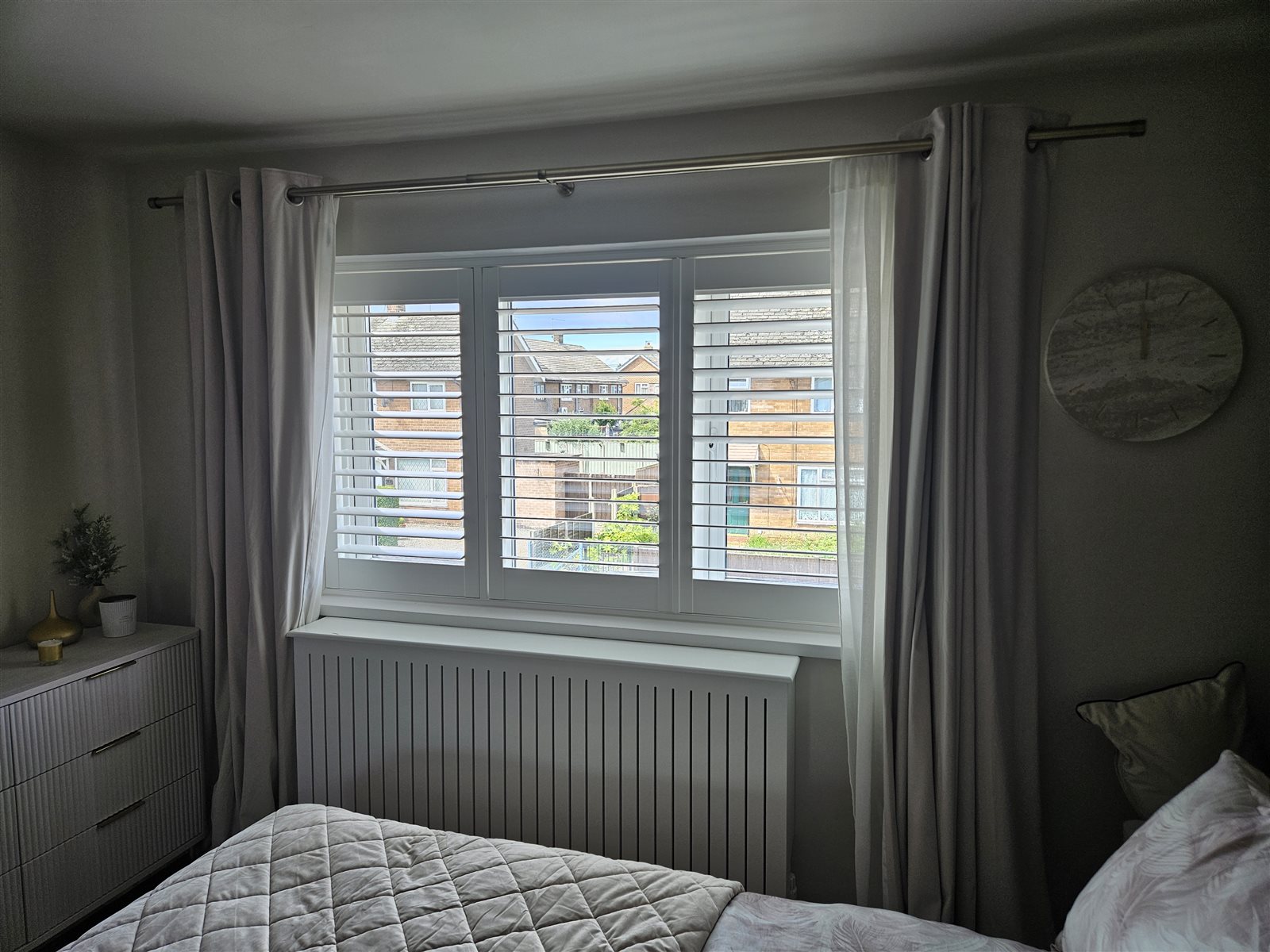 White polyvinyl shutters with the louvres open on a bedroom window in Retford, fitted by Eclipse SBC