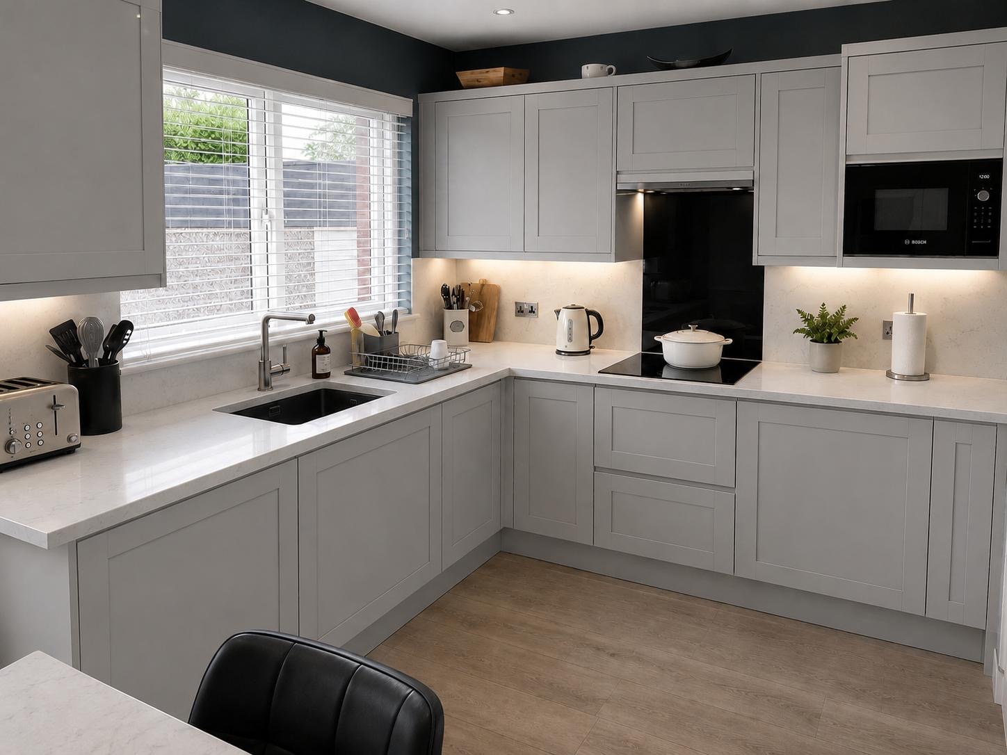 Finished grey shaker kitchen with quartz worktops