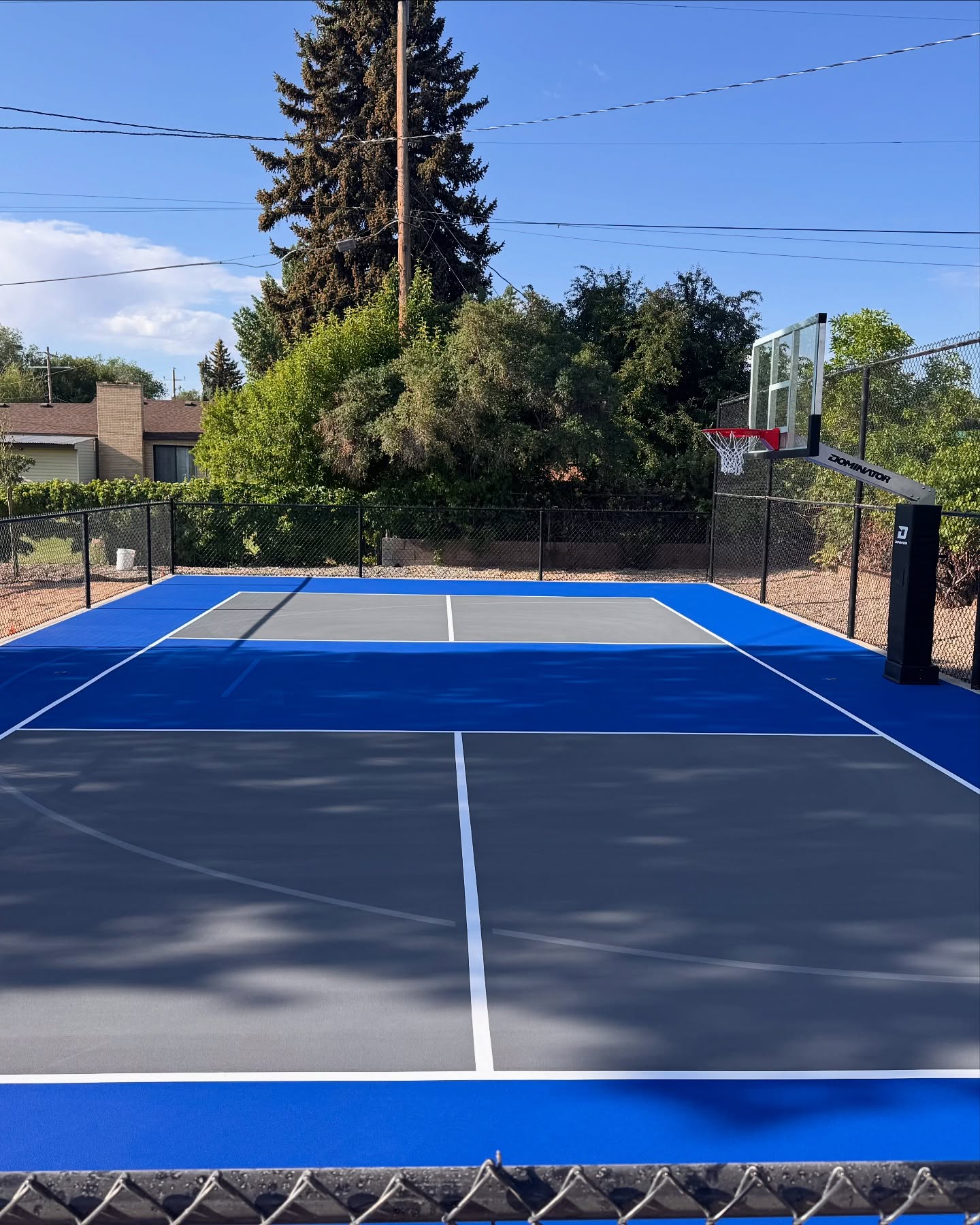 image of a residential pickleball basketball court combination