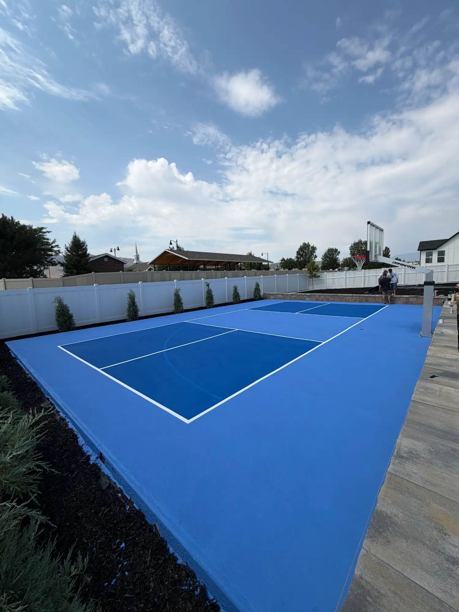 Outdoor pickleball and basketball court combination